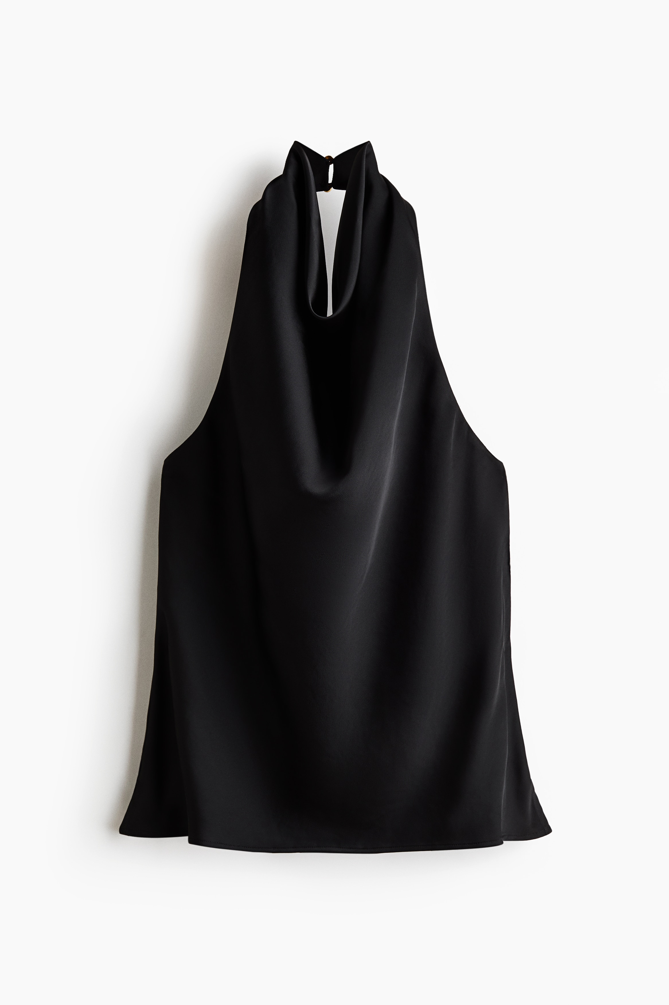 A black halter-neck top, front view, showcasing a draped cowl neckline and a high collar fastened at the back with a small button. This sleeveless garment is crafted from a fluid, smooth fabric that falls into a relaxed, flowing silhouette.