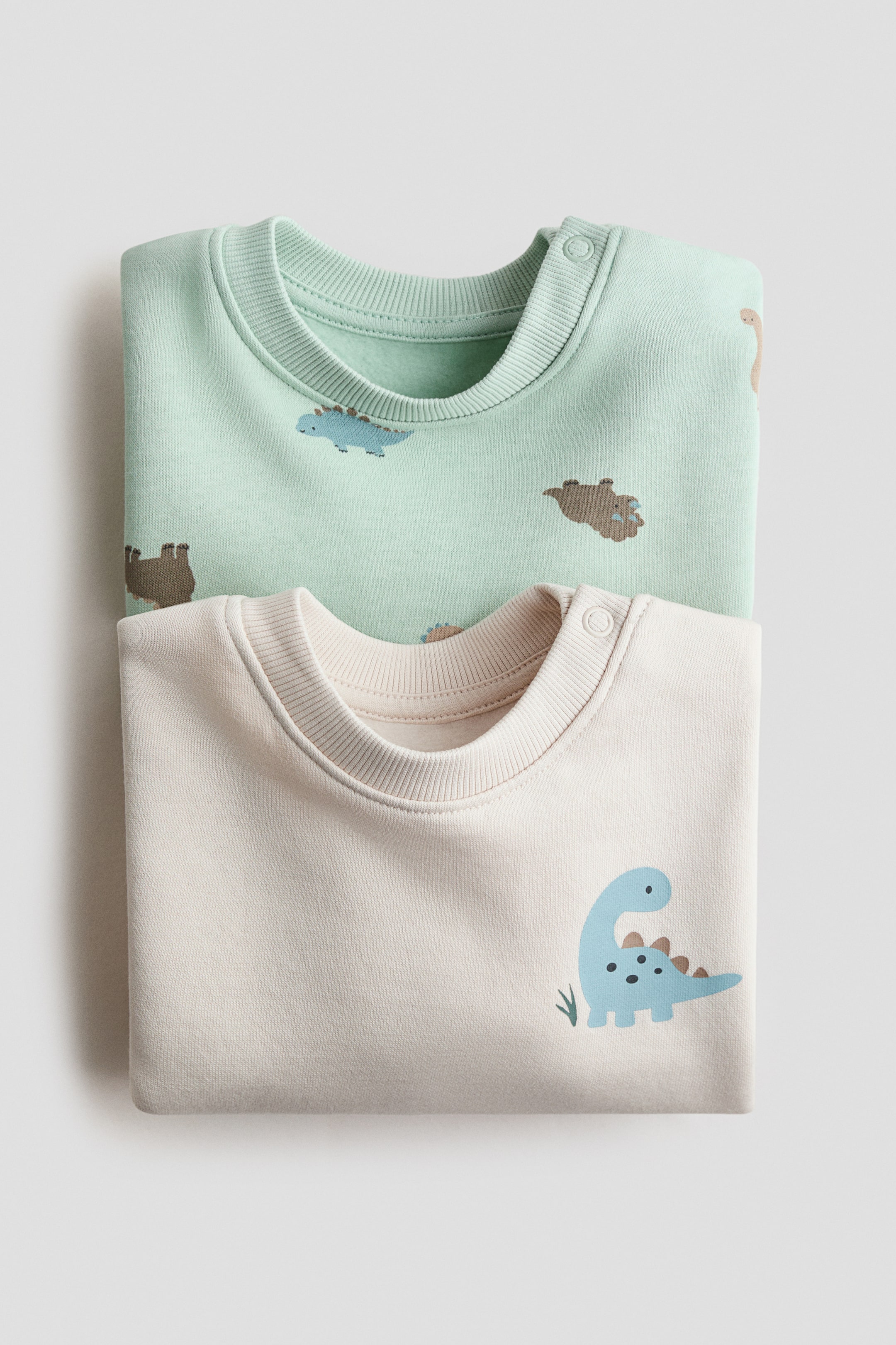 Lot de 2 chandails en molleton imprimés