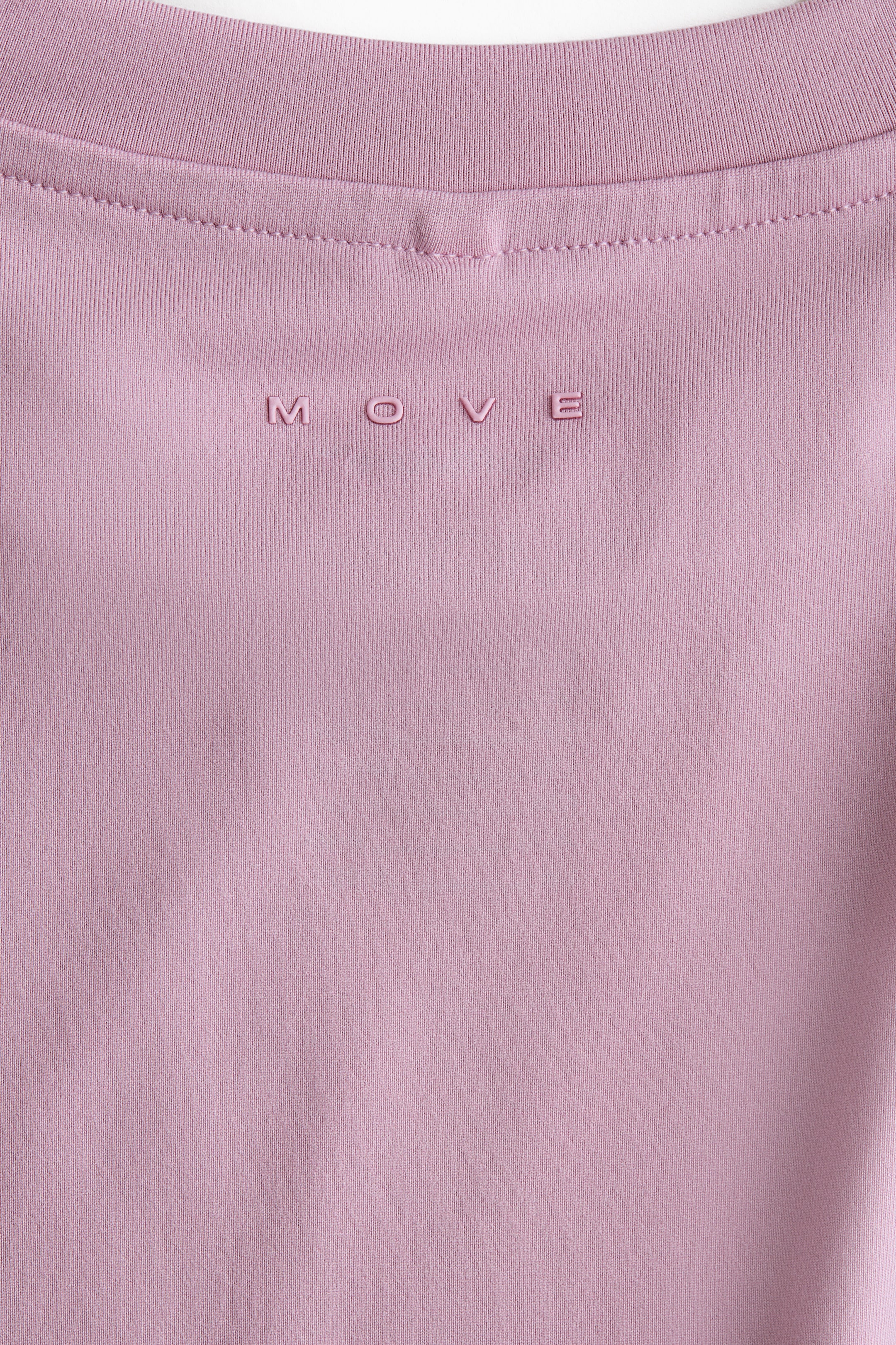 Ampliar la imagen: Sports top with SoftMove™ - Rosa tenue - Kids | H&M MX 6