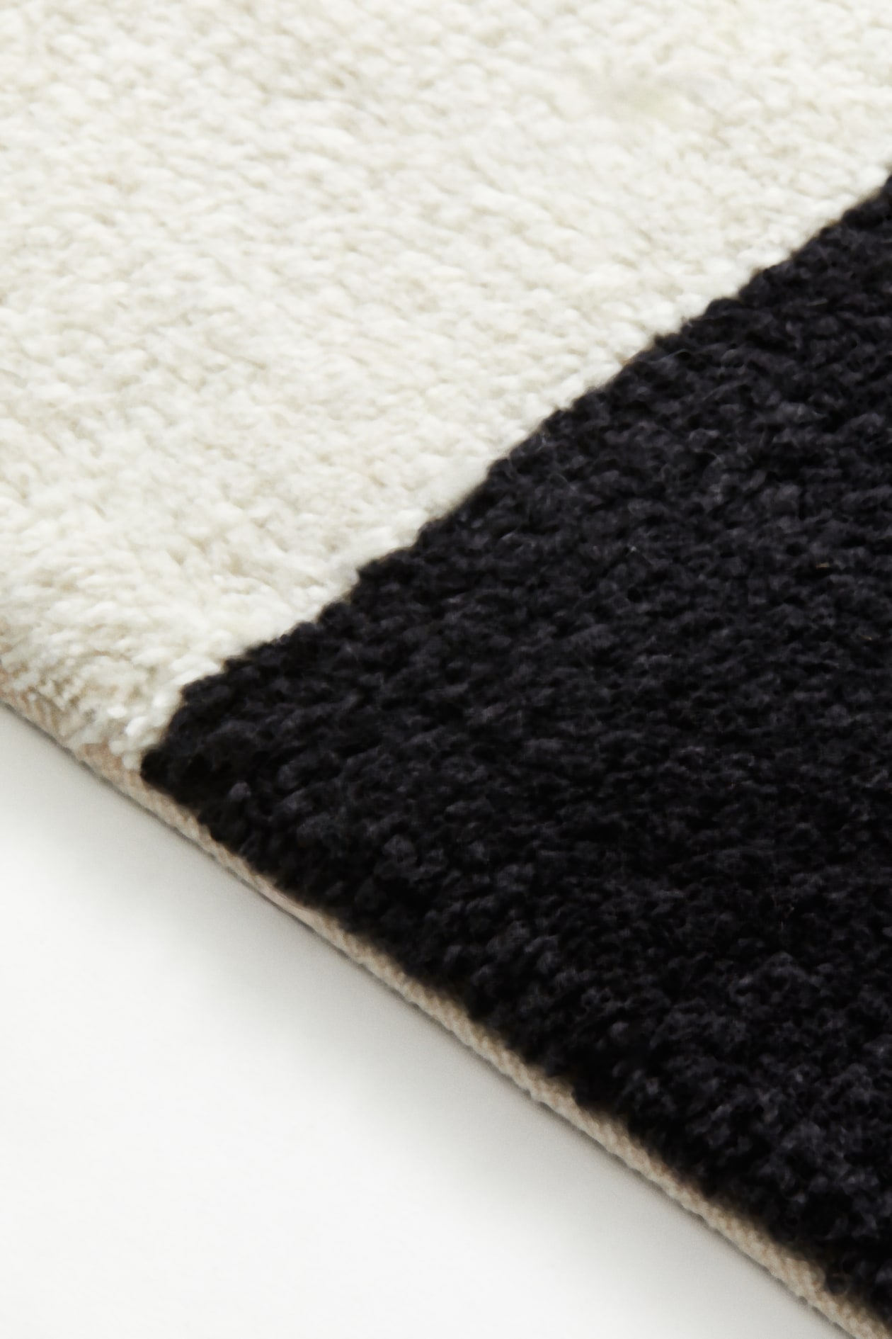Wool Hm Rugs Black/checked Large Wool-blend Rug at H&M Home | H&M US