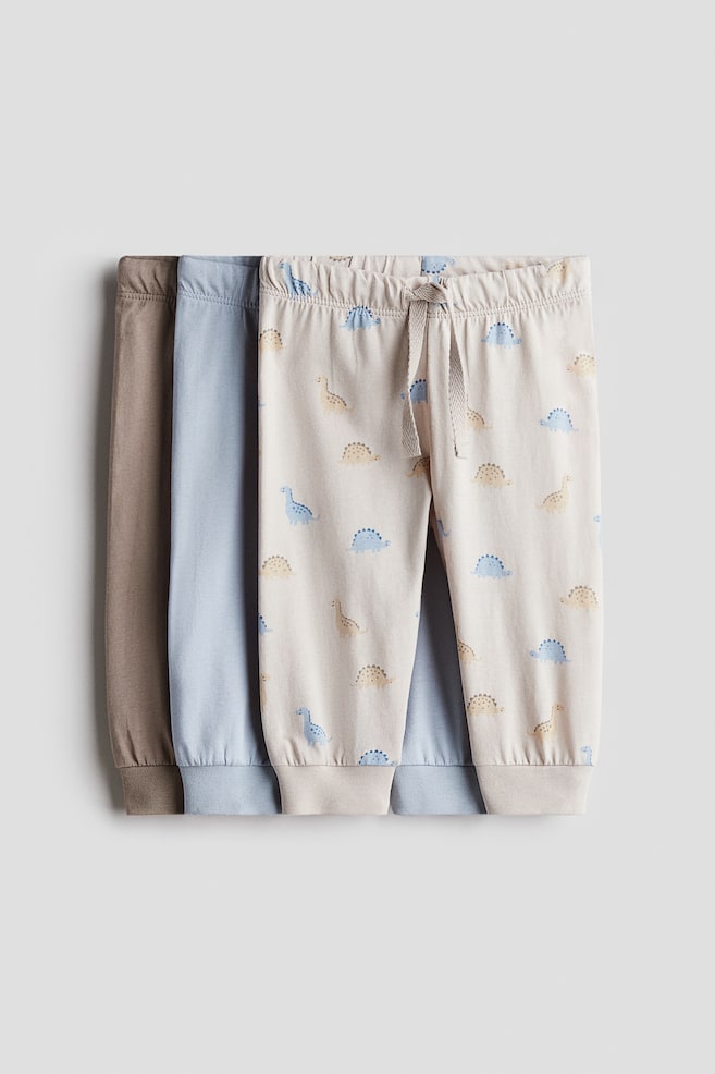 Lot de 3 pantalons jogger en jersey de coton - Beige/dinosaures/Vert kaki/dinosaures/Marron/chiens/Gris clair/turquoise/Vert clair/voitures - 1