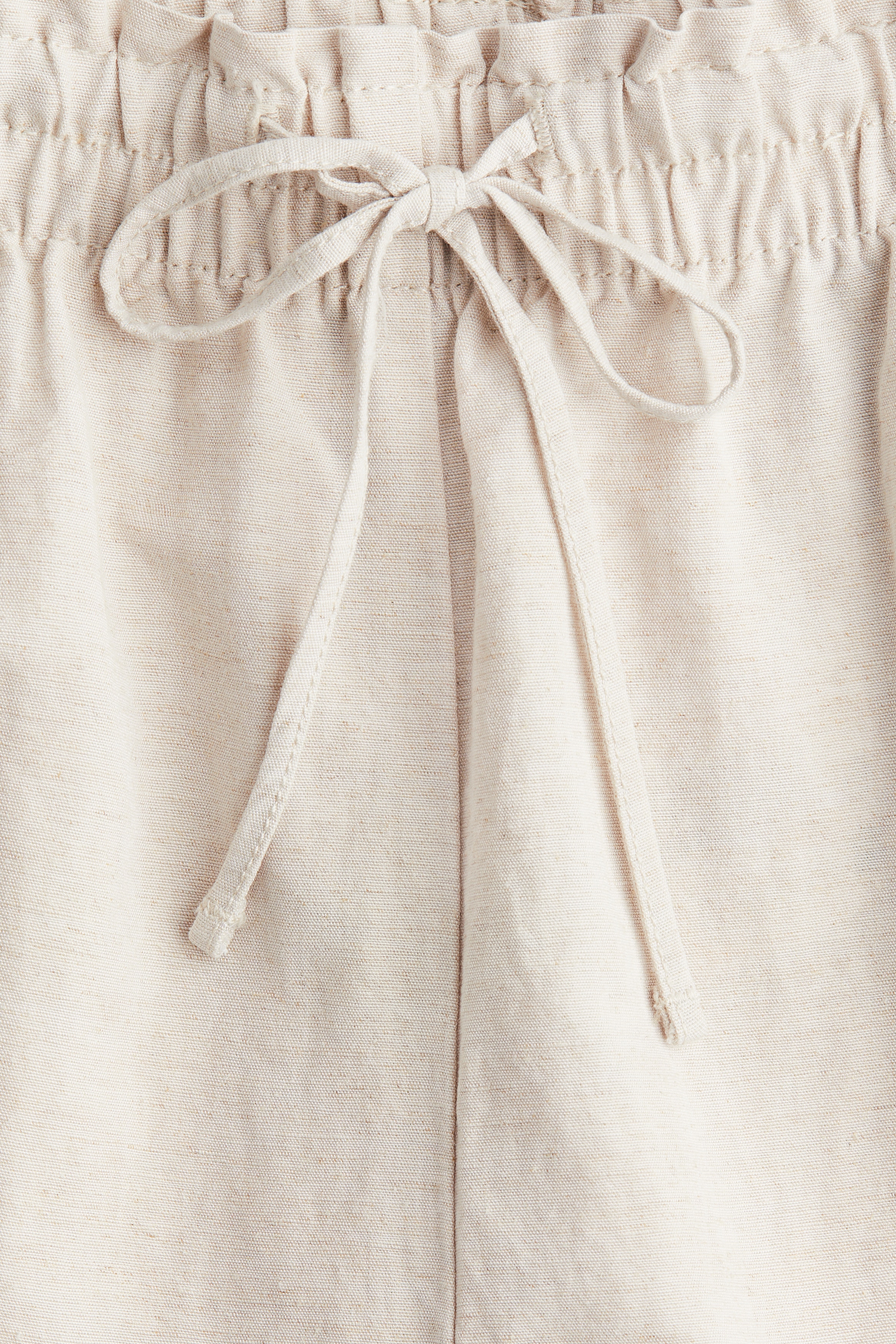 Cropped linen-blend trousers