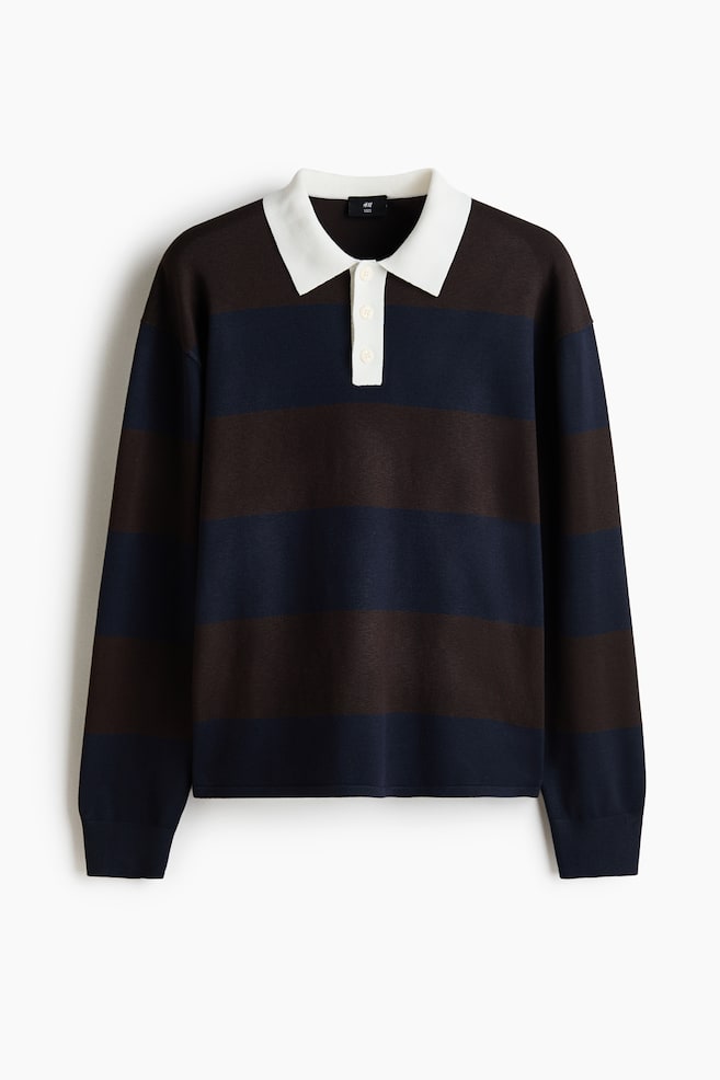 A long-sleeved polo shirt is featuring alternating dark brown and dark blue horizontal stripes, a contrasting white collar, a white three-button placket, ribbed cuffs, and a ribbed hem. - 1