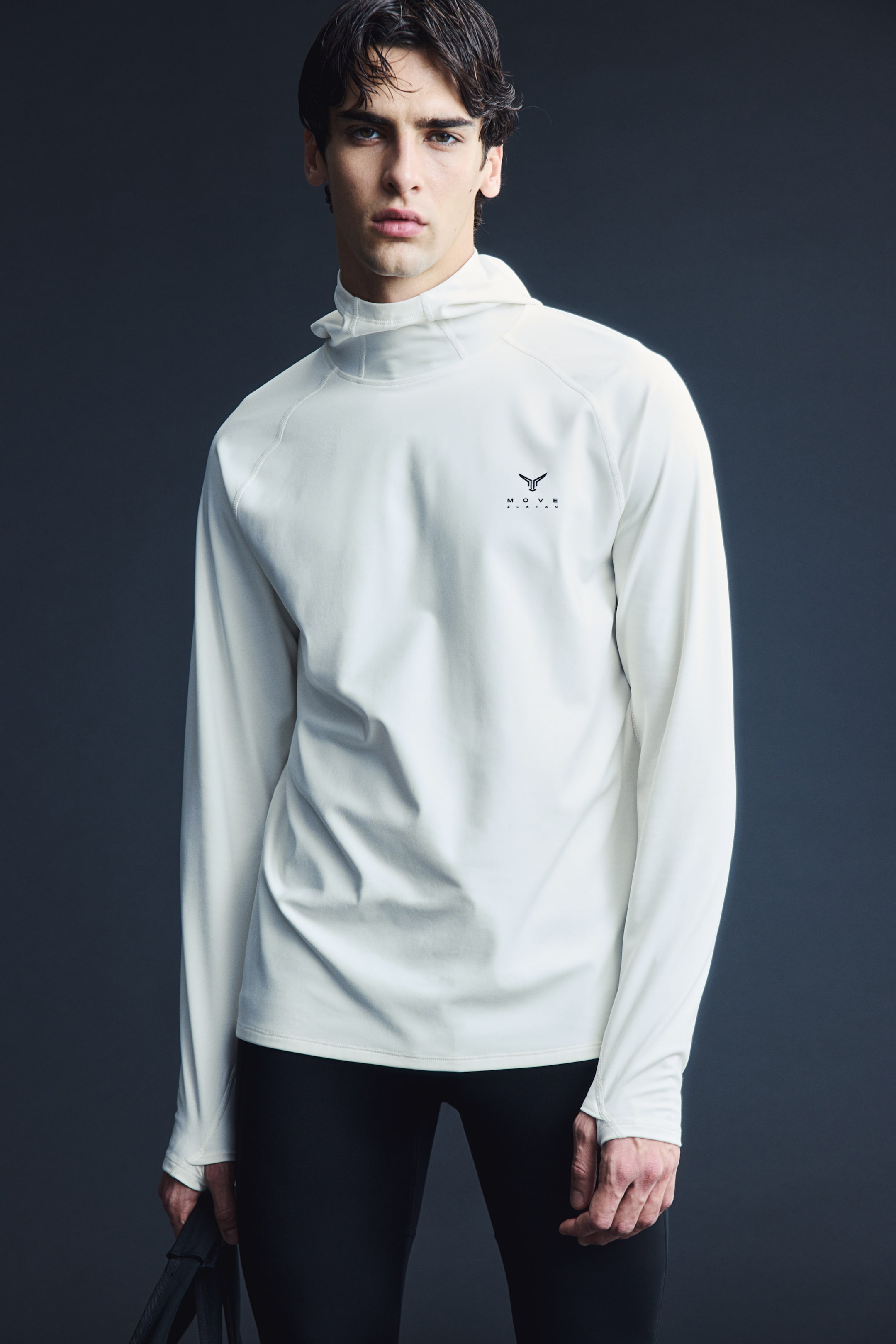 View larger image: Warming sports hoodie with ThermoMove™ - Cream/Move Zlatan - Men | H&M IN 4