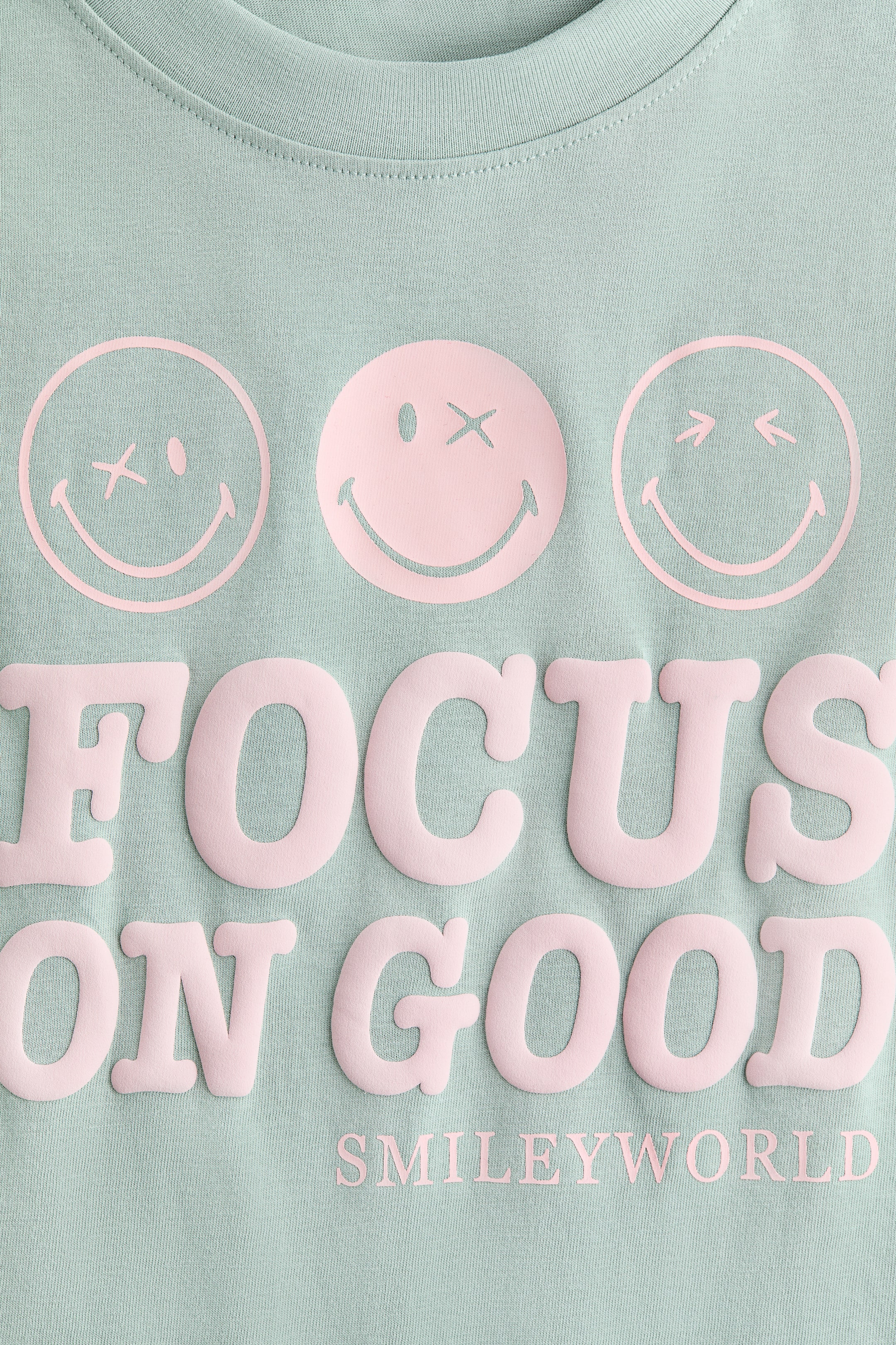 View larger image: Cotton T-Shirt with Printed Motif - Light green/SmileyWorld® - Kids | H&M US 2