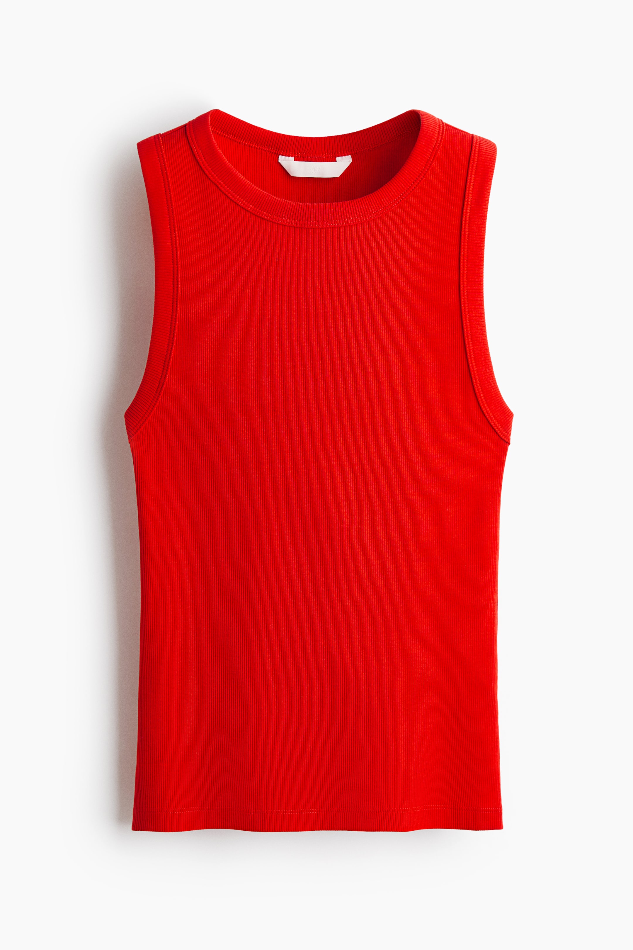 View larger image: Displayed from the front is a red fitted vest top. Crafted from ribbed cotton jersey, it features ribbed trims around the neckline and armholes.