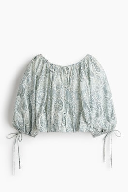Oversized blus med knytdetalj