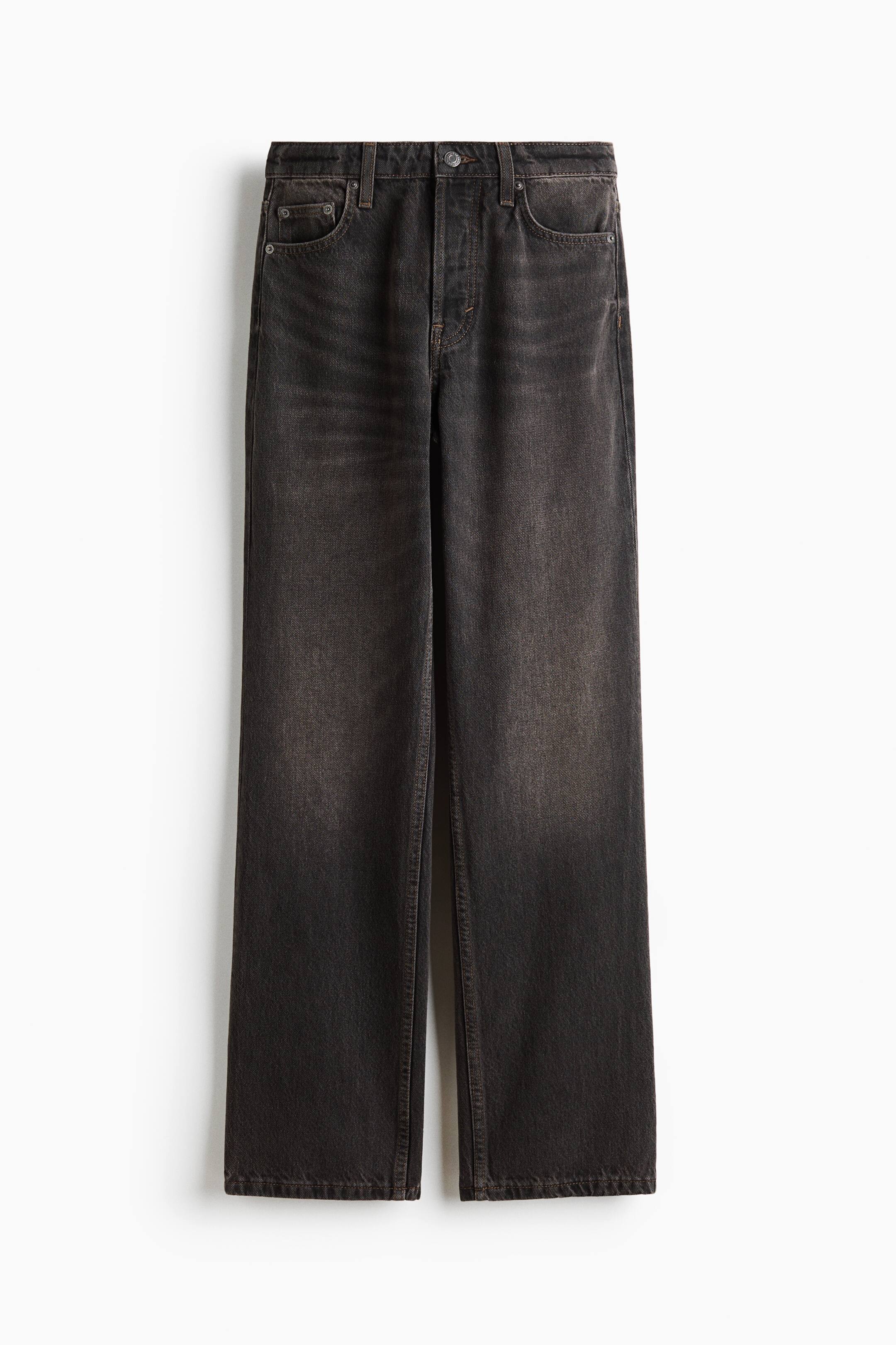View larger image: A pair of high-waisted, five-pocket jeans in washed dark grey denim hangs flat from a front angle, showcasing a straight-leg silhouette and a button fly. The jeans feature subtle fading along the thighs and hips, with classic pocket detailing and belt loops.