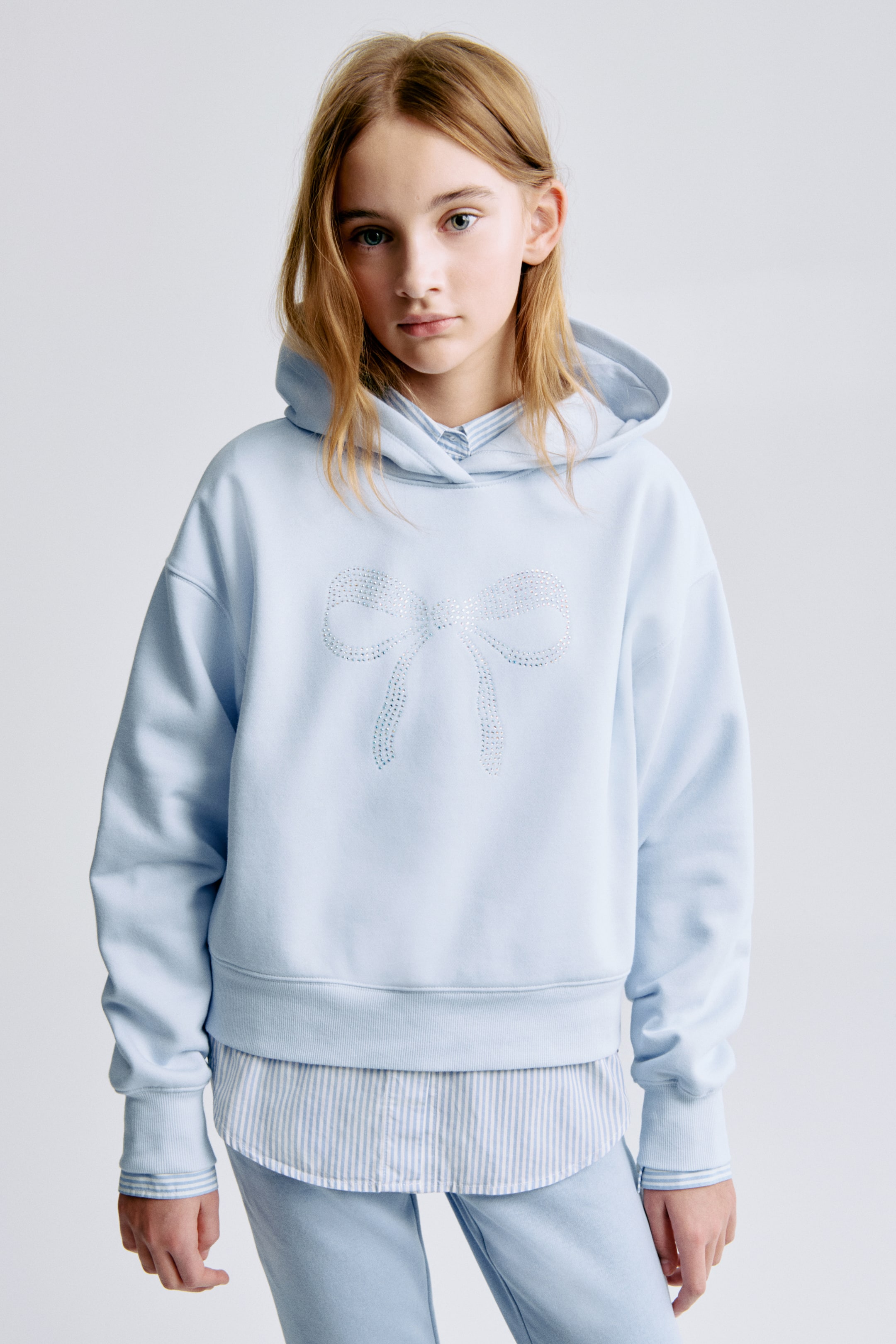 View larger image: Oversized motif-detail hoodie - Light blue/Bow - Kids | H&M IE 3