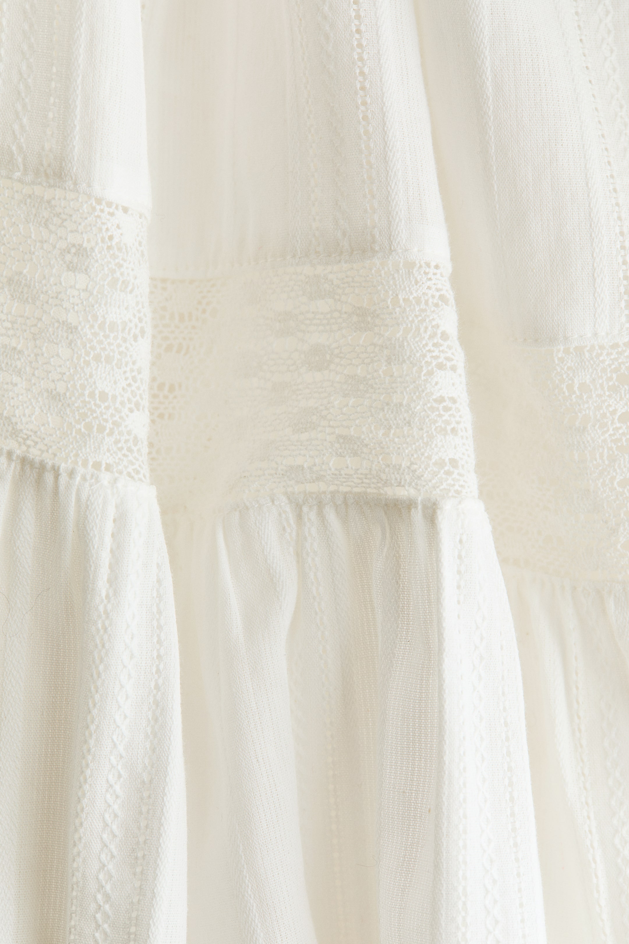 Blouse péplum avec dentelle
