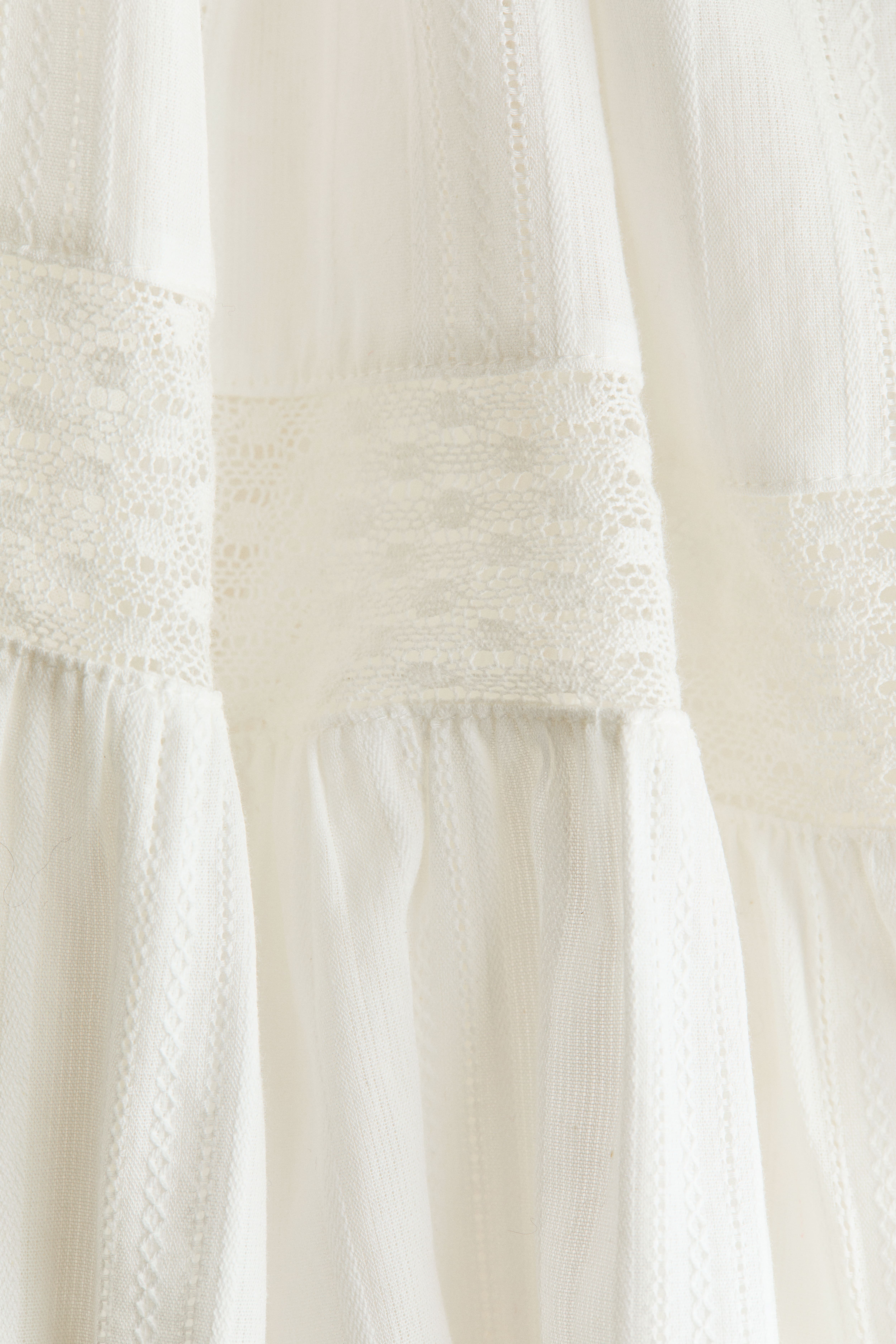 Blouse péplum avec dentelle