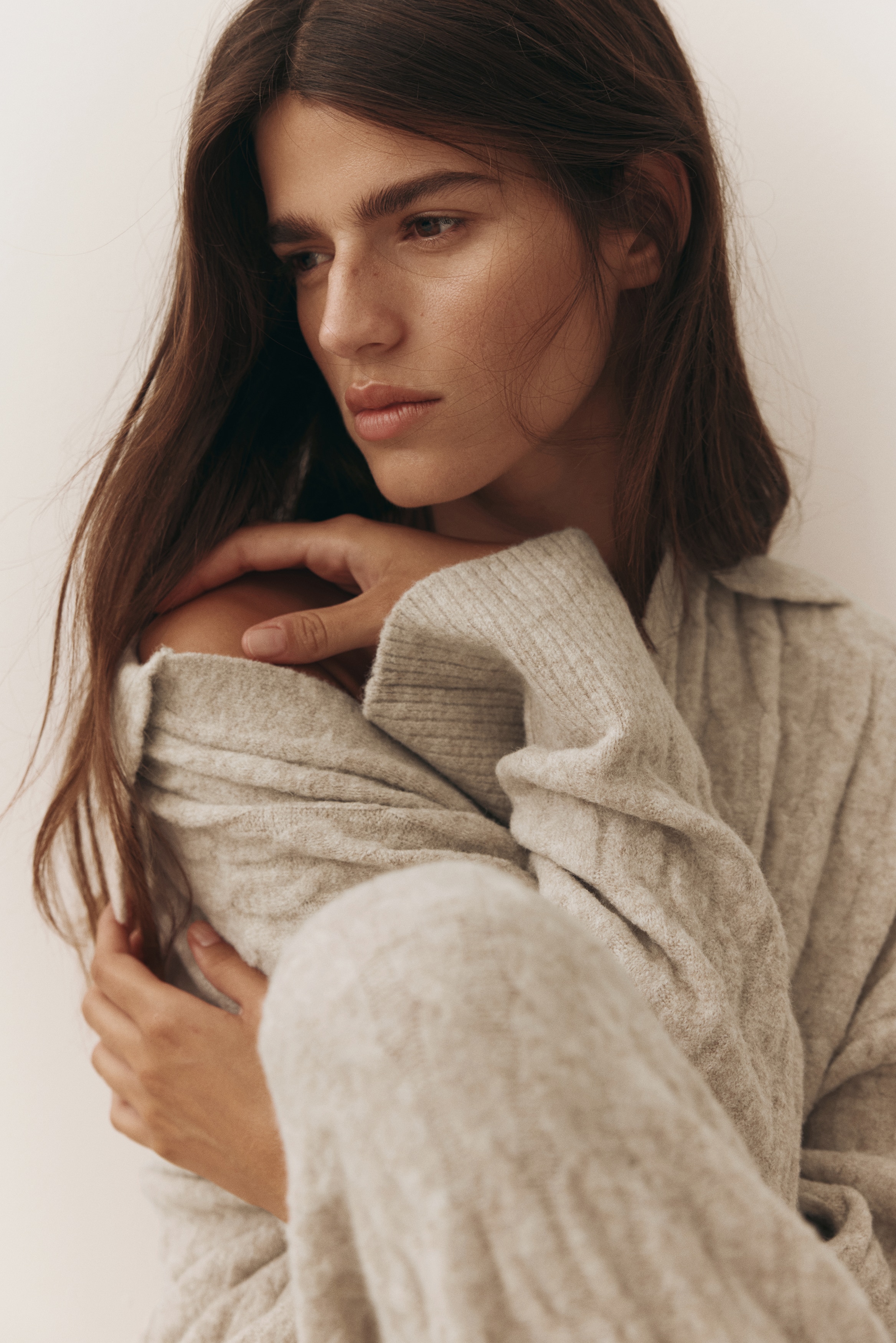 Cable-knit polo jumper
