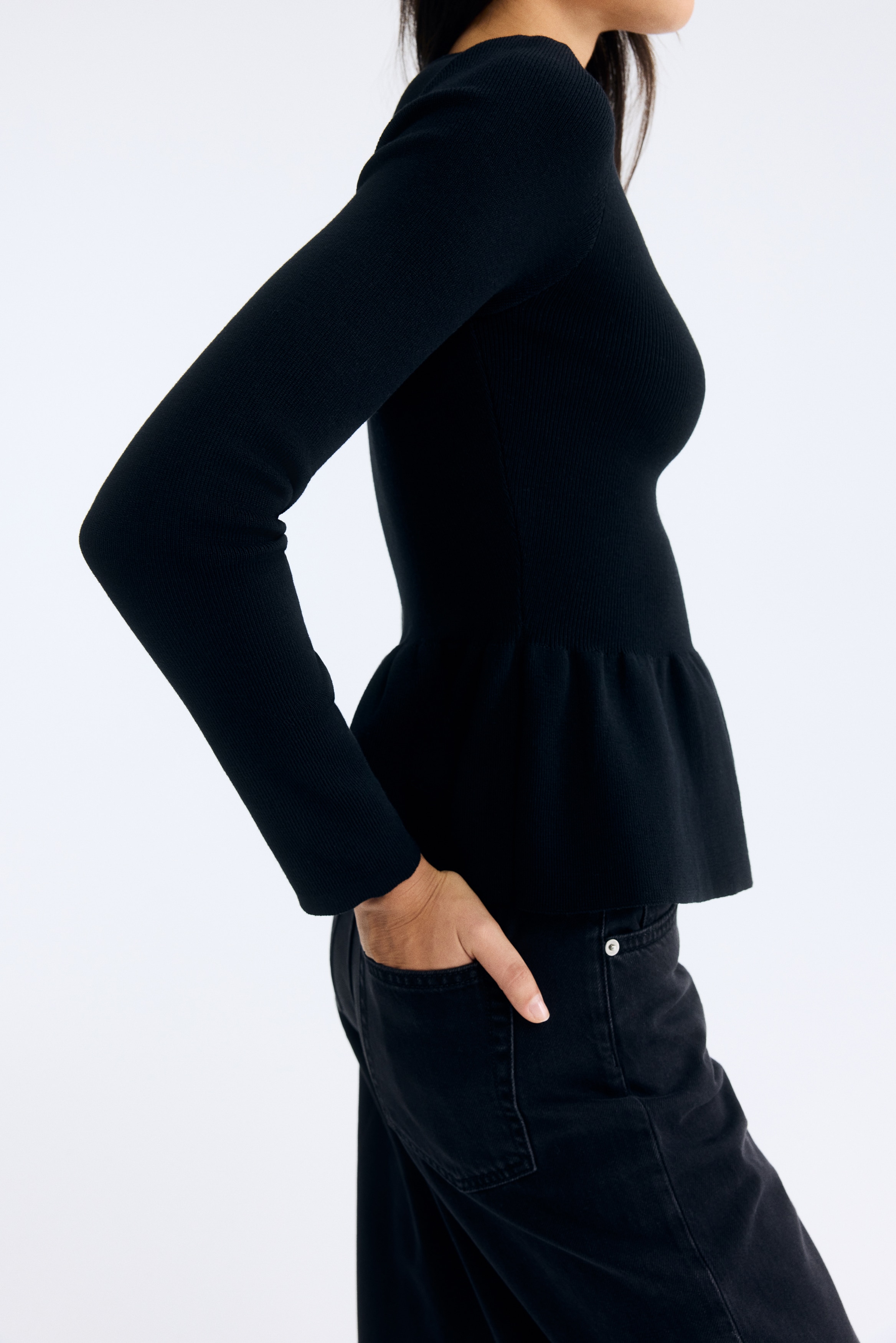 Knitted peplum top