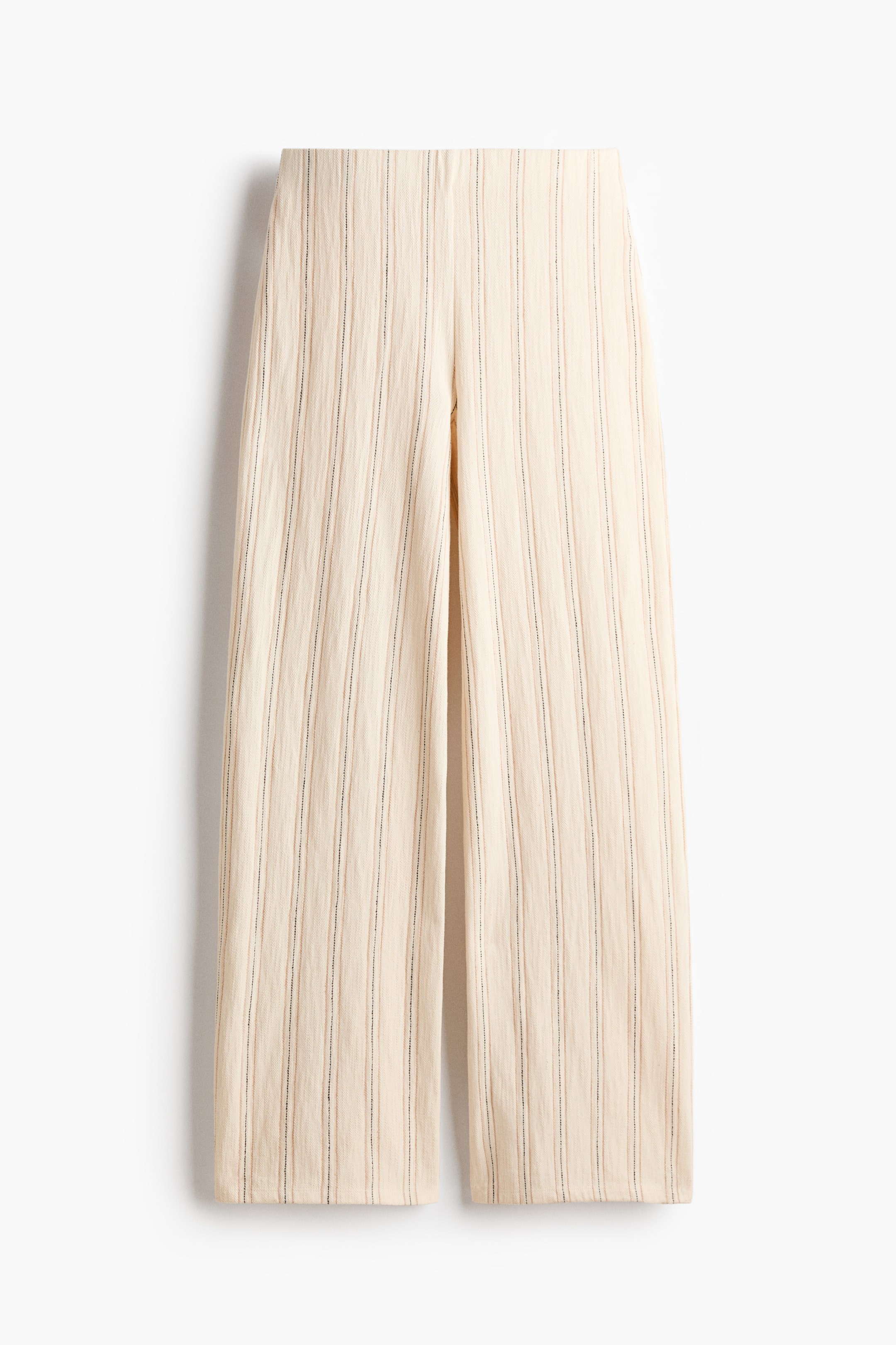 Agrandir l'image: Le pantalon en coton texturé à enfiler est de couleur beige clair, avec de fines rayures verticales sombres sur toute la surface. Il présente une silhouette à jambes larges avec une ceinture plate et sans coutures, vue de face.