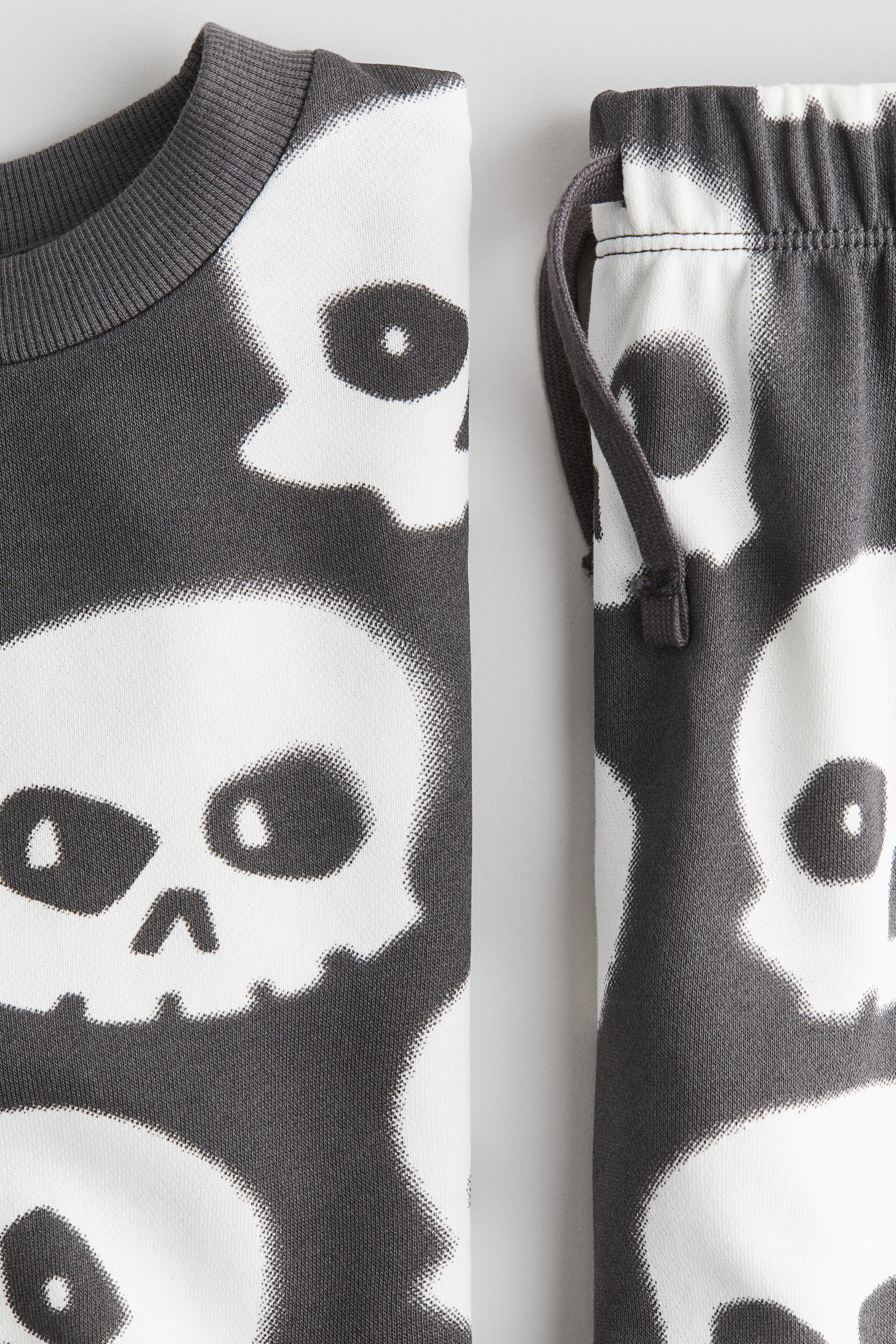 2-piece Patterned Sweatsuit - Dark gray/skulls - Kids | H&M US