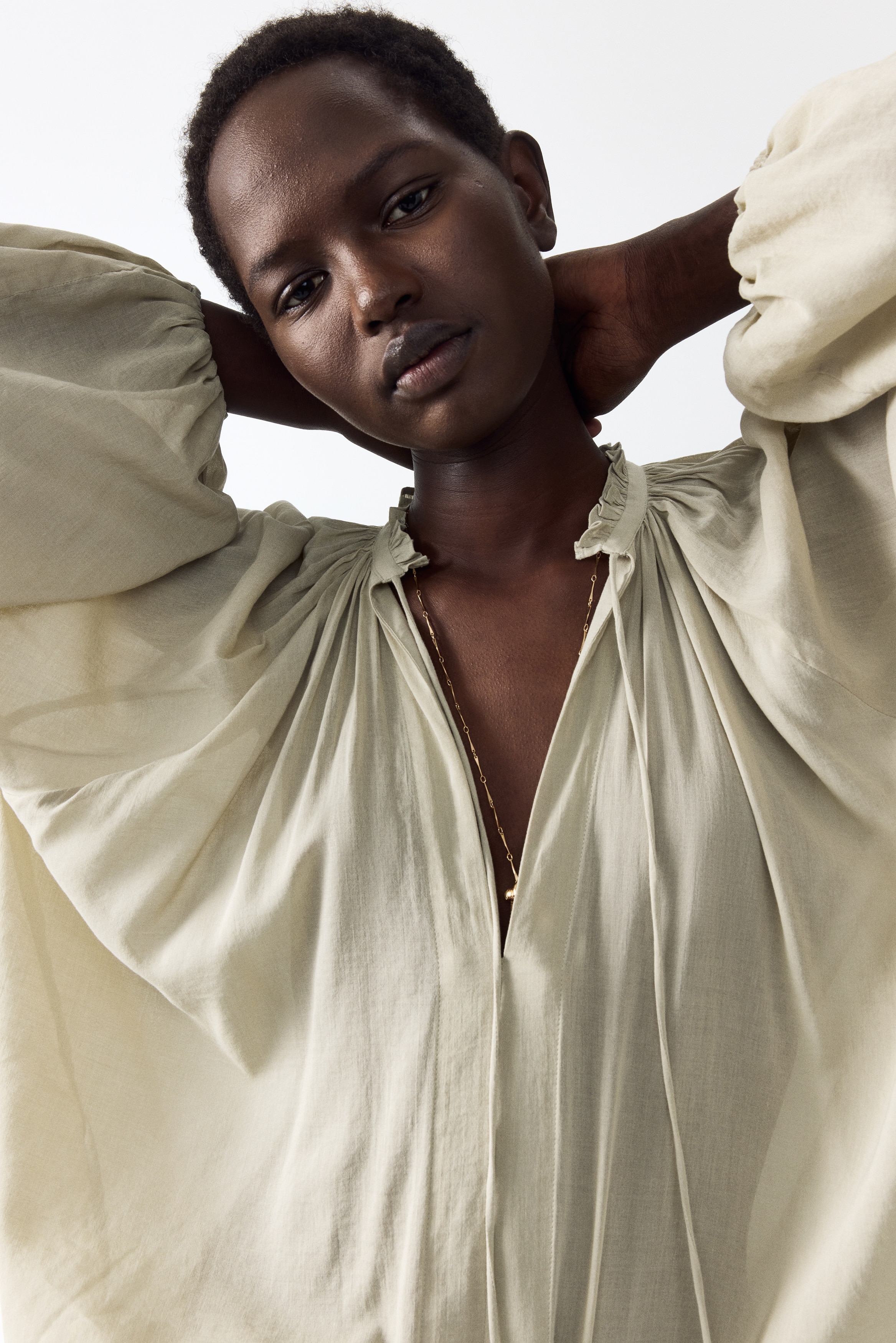 Oversized blus i bomullsmixModell