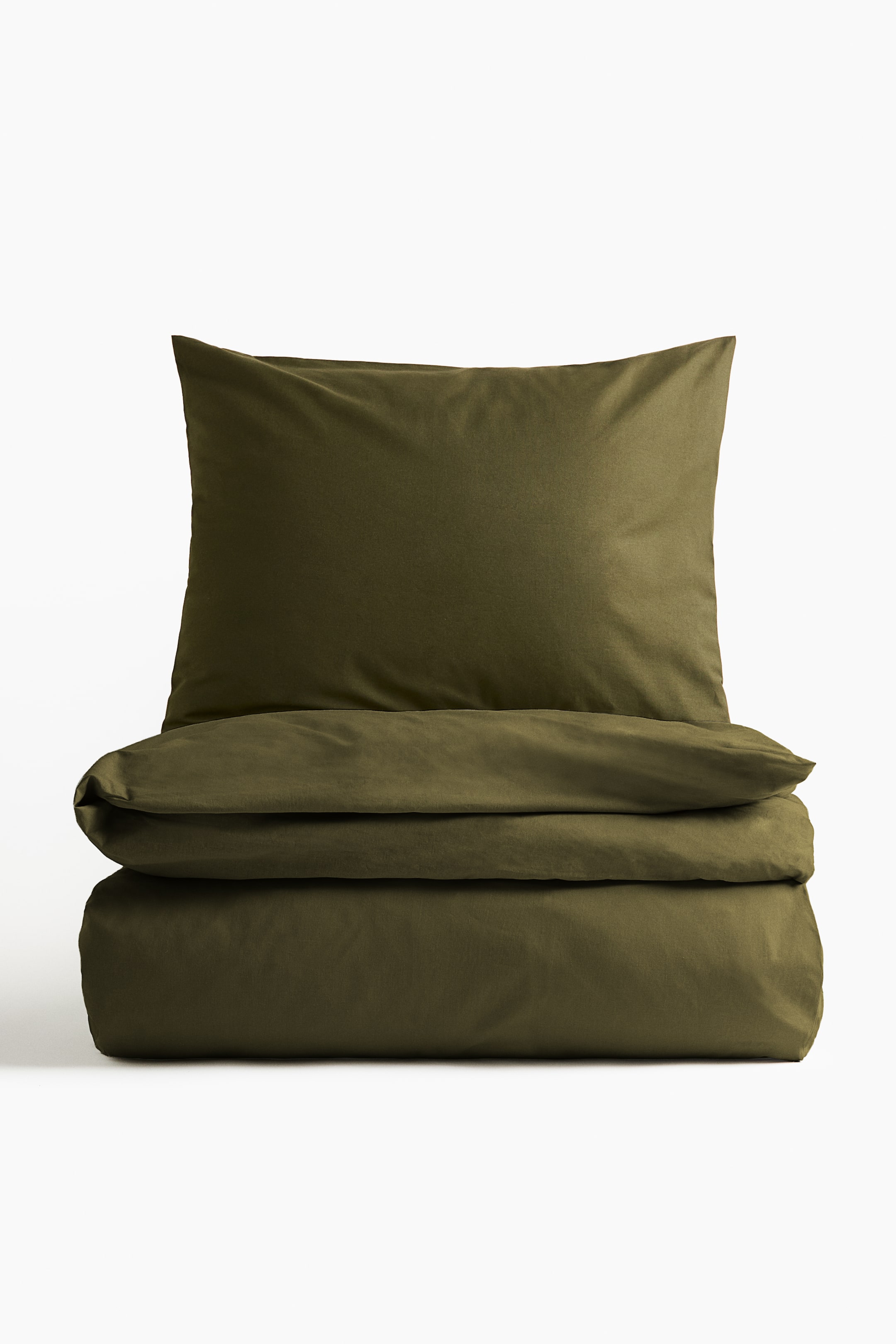View larger image: A single duvet cover set, made from fine-threaded cotton with a 144 thread count, is presented front-on in a dark olive green color. The duvet cover is neatly folded into a rectangular stack, and a matching pillowcase with an envelope opening is resting horizontally on top.
