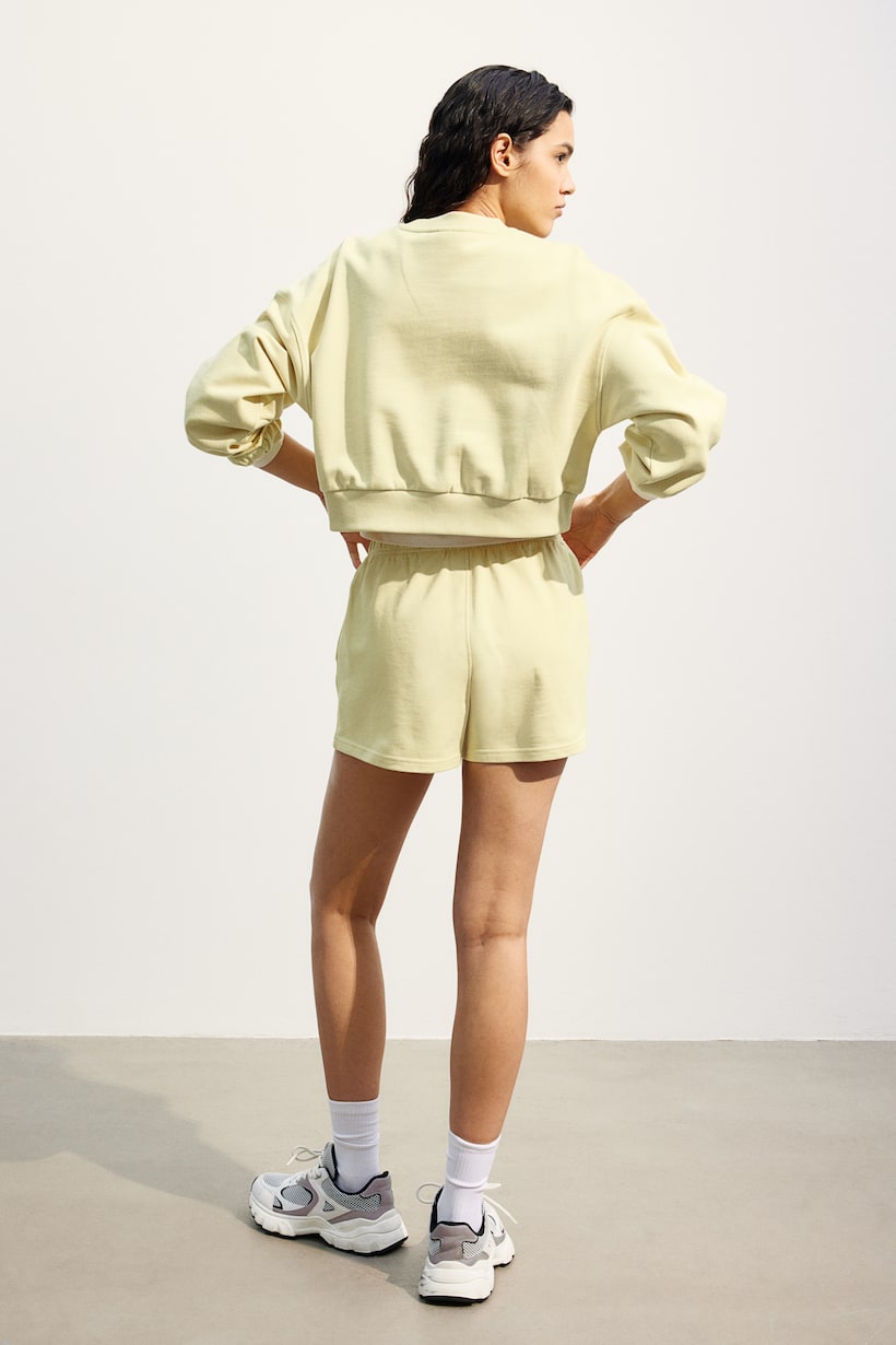 Short Sweatshirt - Dusty yellow - Ladies | H&M US