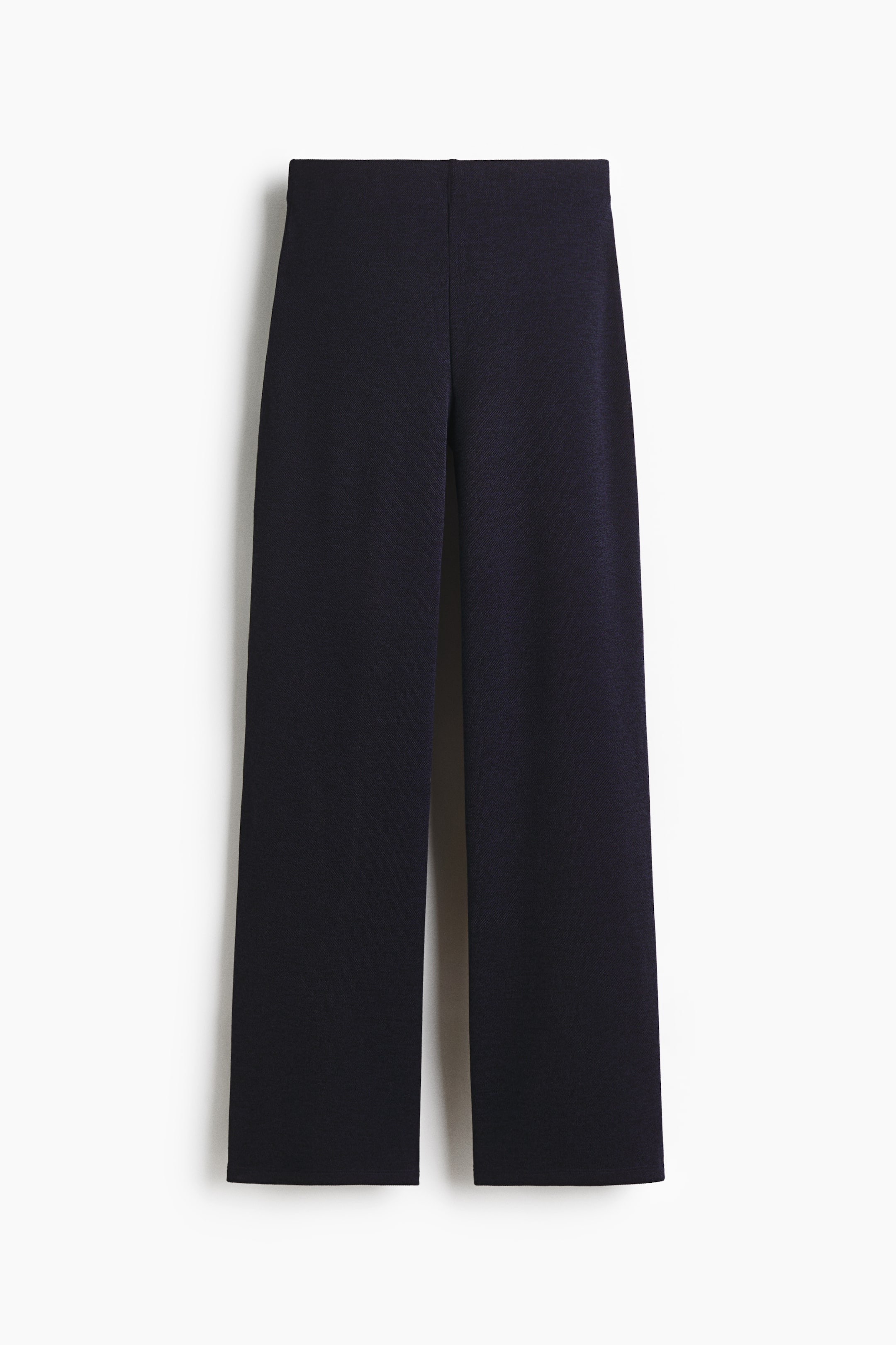 View larger image: The front of slim-fit jersey pants features a high waist and straight legs.