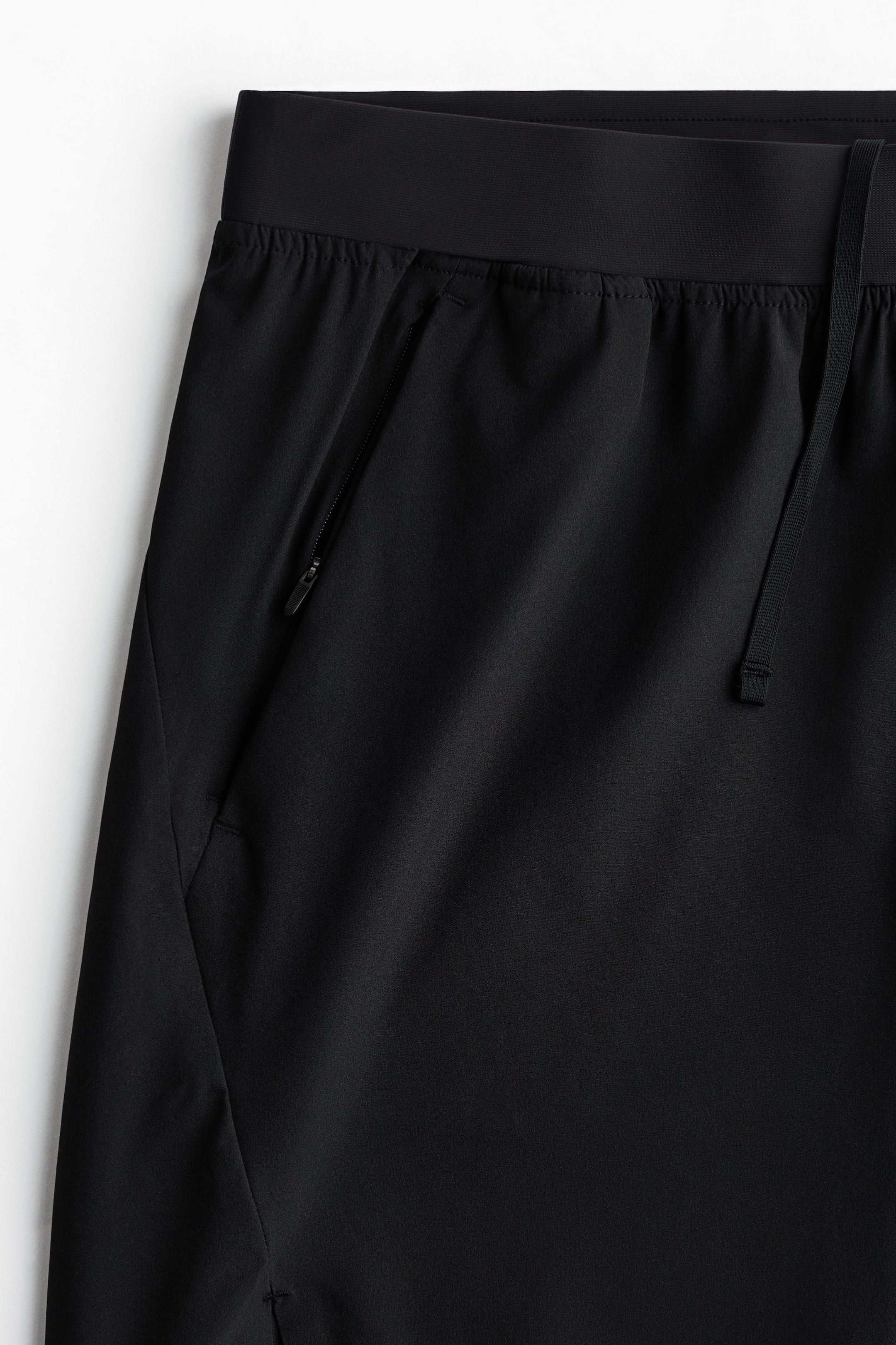 Ampliar la imagen: Shorts deportivos de largo medio con DryMove™ - Negro - Men | H&M MX 5