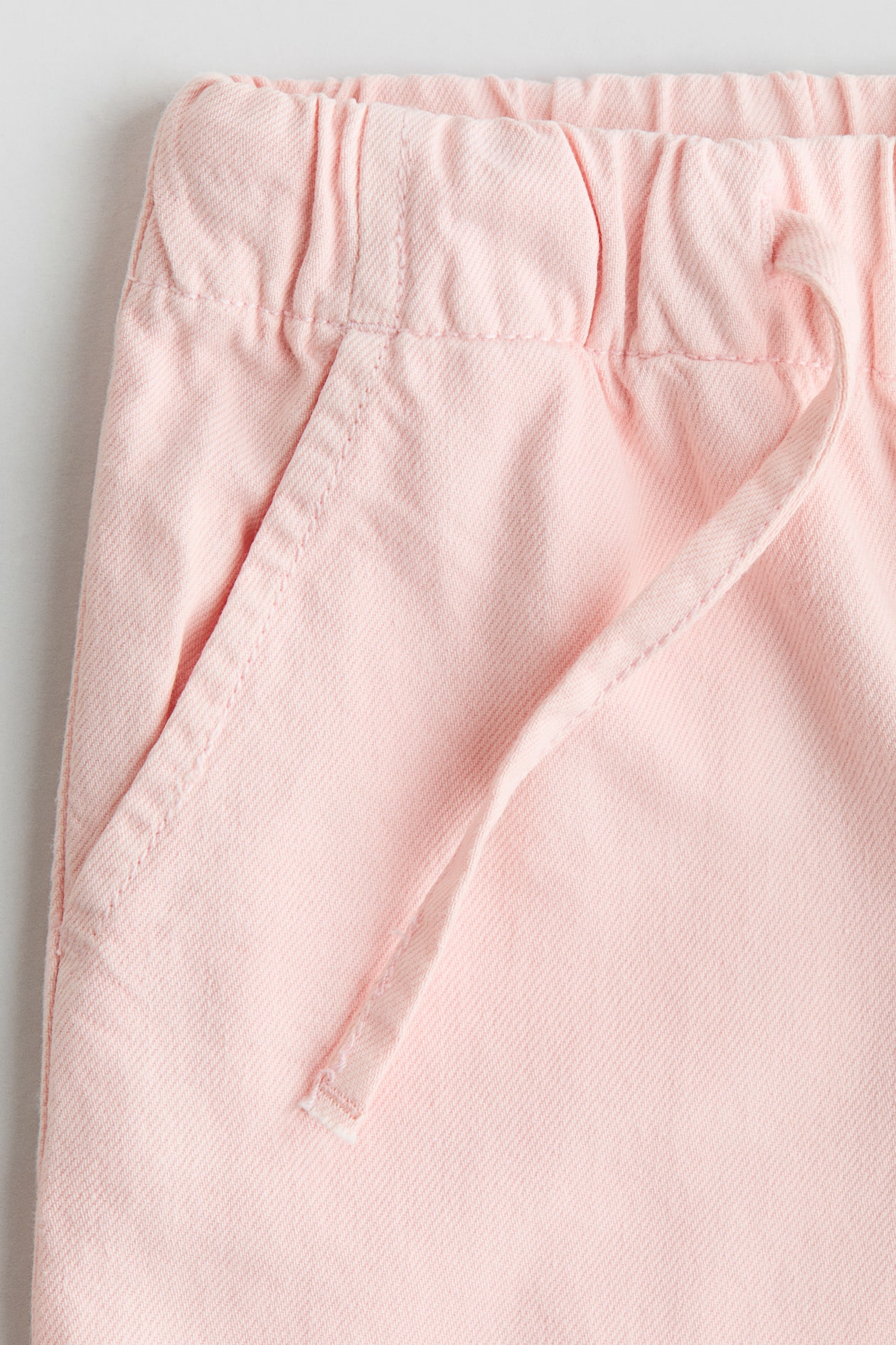 Light pink Ruffle-Trimmed Cotton Pants for kids | H&M US