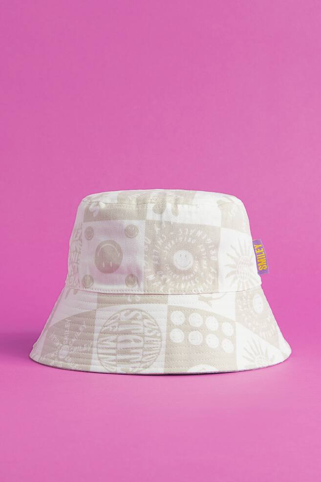 Patterned cotton twill bucket hat - Light beige/Smiley® - 1