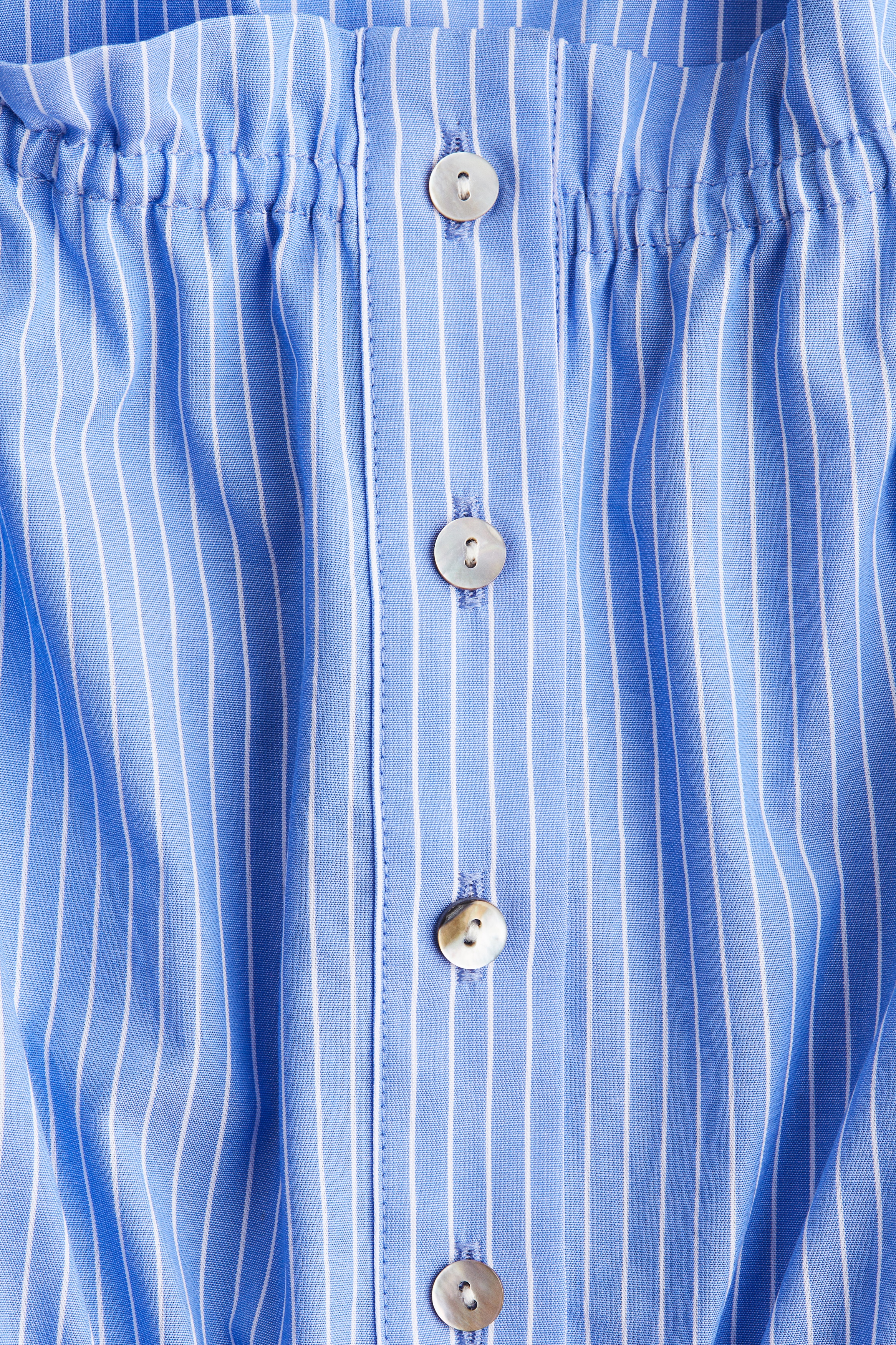 Frill-trimmed cotton blouse