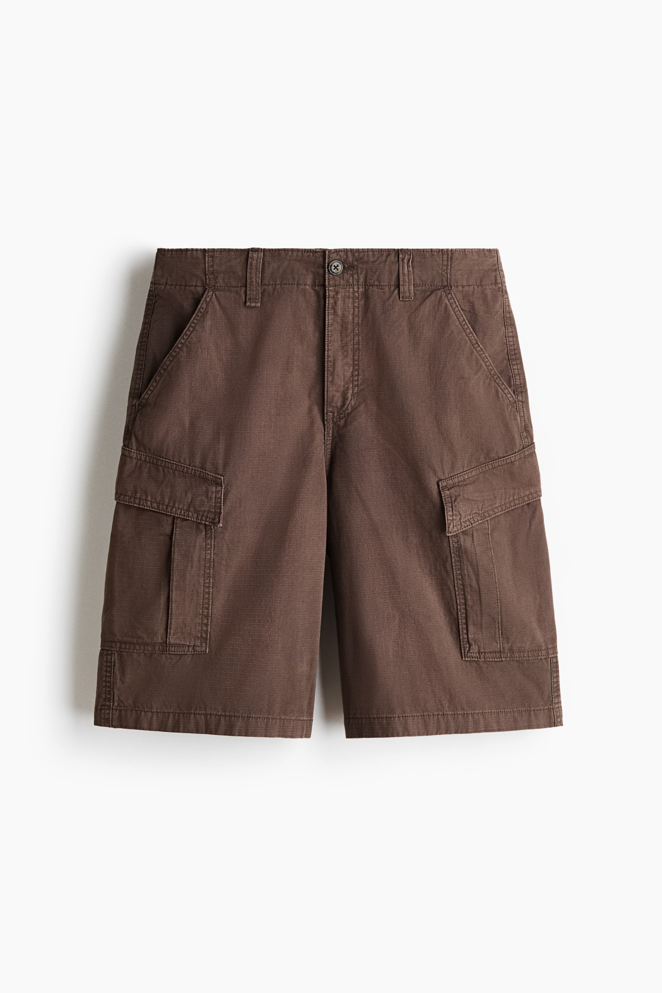 View larger image: Brown cargo shorts are shown from the FRONT view, highlighting a button closure at the waist, belt loops, and front slash pockets. Flap cargo pockets can be seen on the outer sides of the thighs, with the fabric showcasing a textured, muted brown hue.