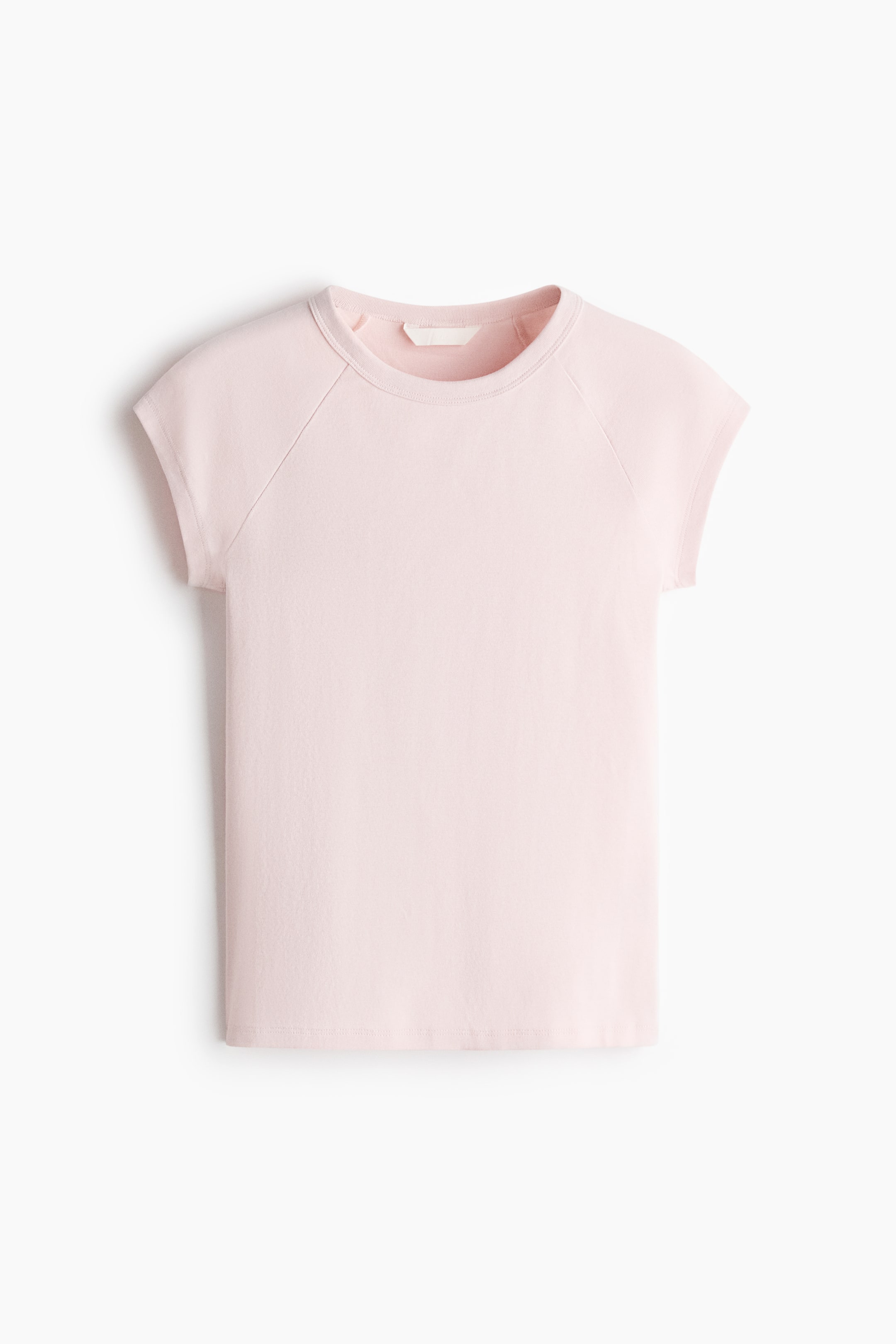 View larger image: The front of a pink t-shirt is shown, highlighting a round, ribbed neckline. It features short raglan sleeves and a straight-cut hem.