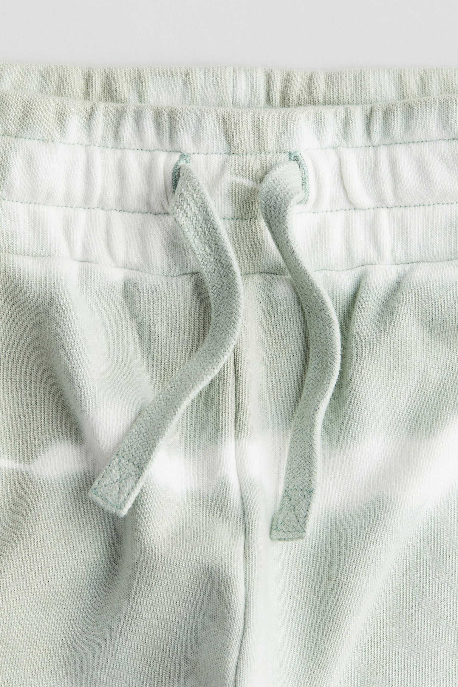 Quần short nỉ in hình - Màu xanh lá nhạt/Tie-dye/Màu đen/Tie-dye - 2