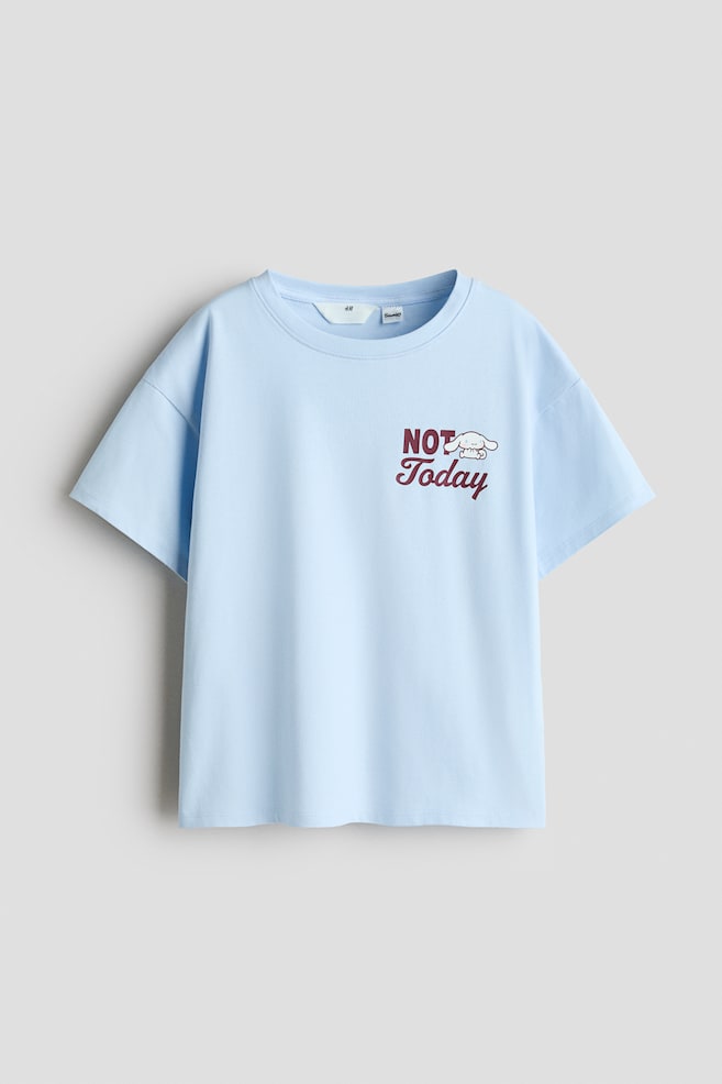 Printed cotton T-shirt - Light dusty blue/Cinnamoroll/Light dusty blue/CapyFun/Ivory/SmileyWorld®/White/Pochacco/Dark grey/Lilo & Stitch/Light grey marl/Kuromi/White/KPop Demon Hunters/Black/KPop Demon Hunters/White/Hello Kitty/Light yellow/CapyFun/Light pink/Snoopy/Pink/Lilo & Stitch - 1