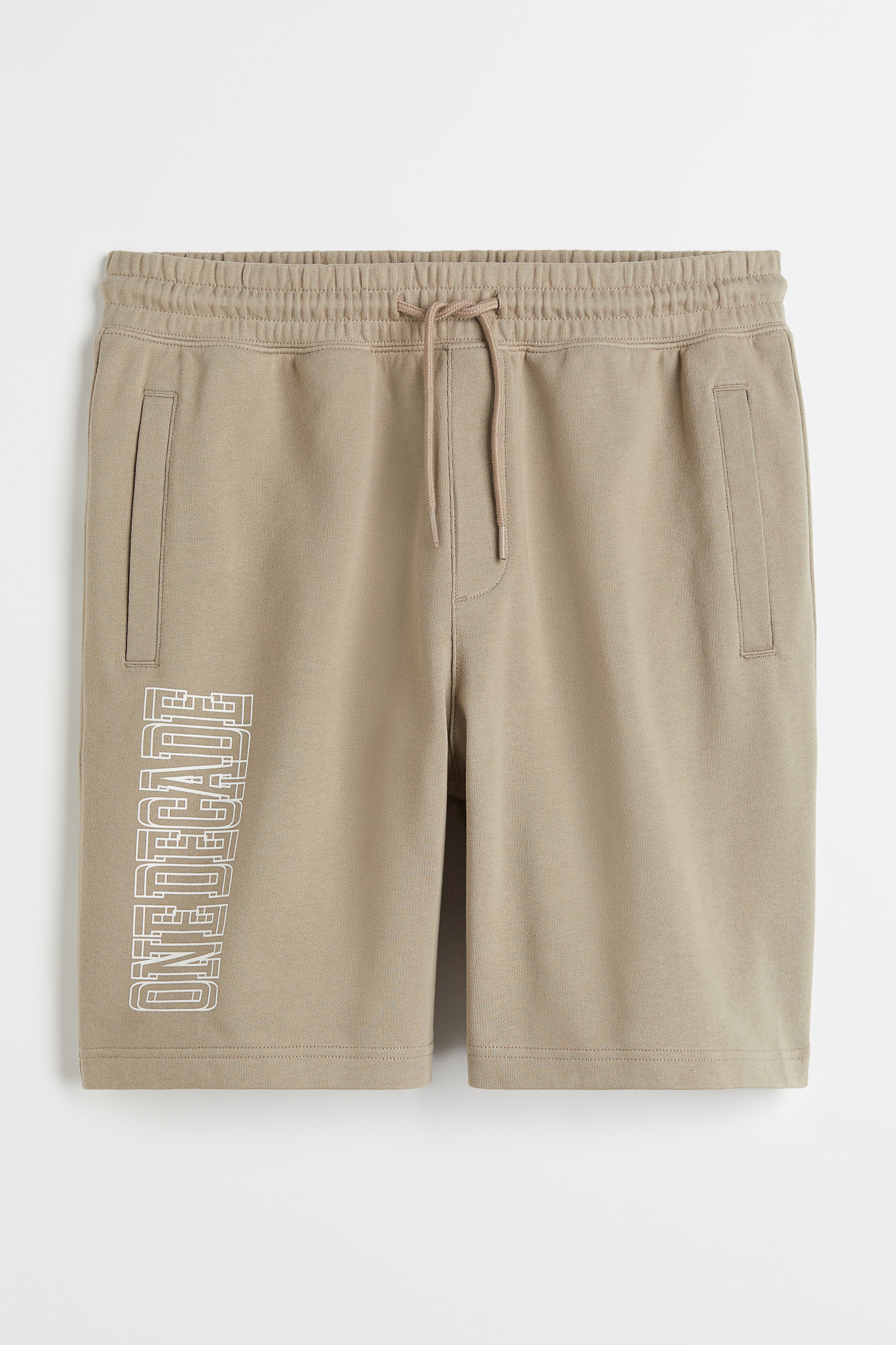View larger image: Relaxed Fit Printed sweatshorts - Beige/One Decade - Men | H&M IN 1