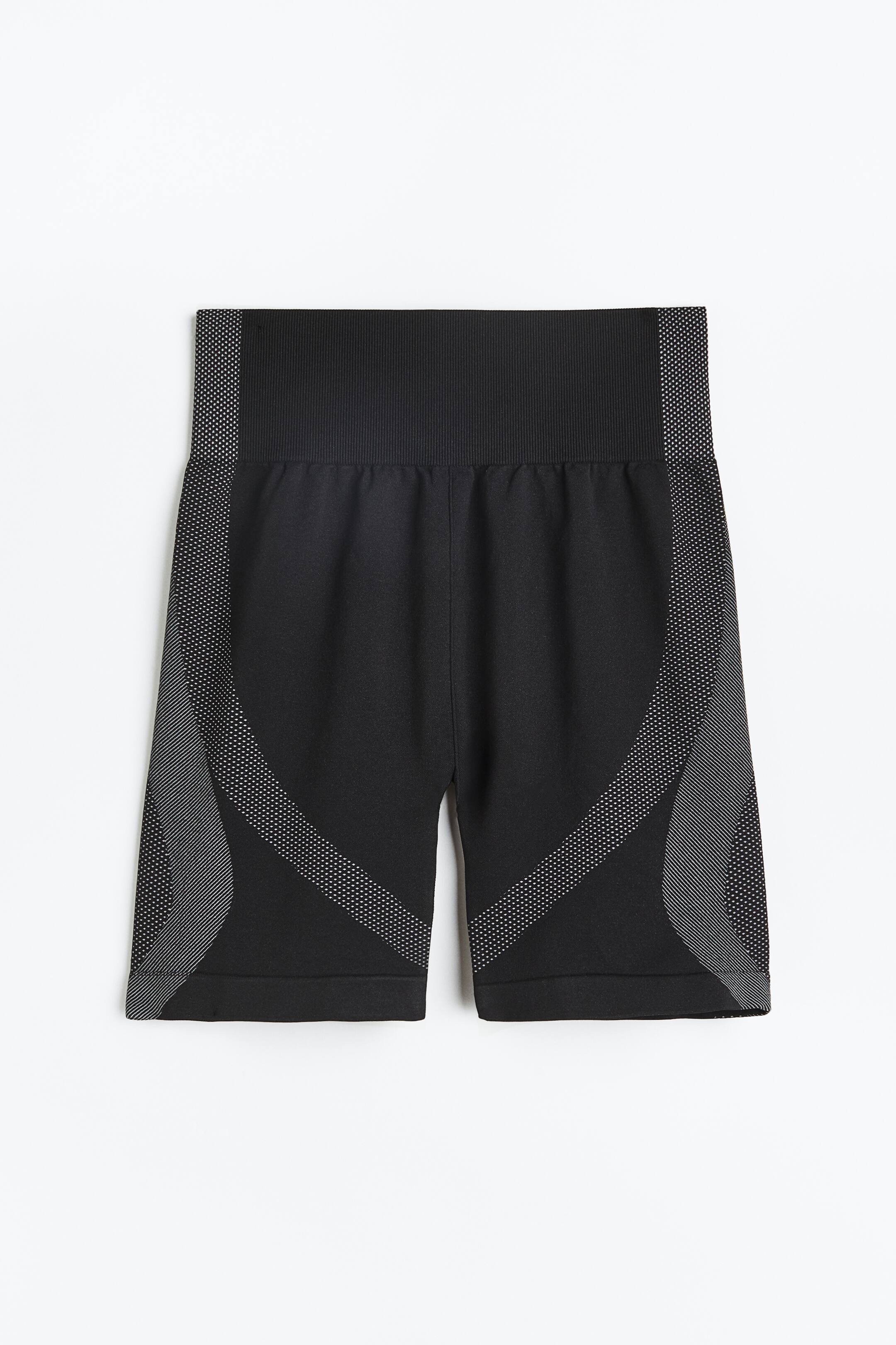 Xem ảnh lớn hơn: Quần short đạp xe thể thao không may vải DryMove™ - Màu đen/Xám - Ladies | H&M VN 1