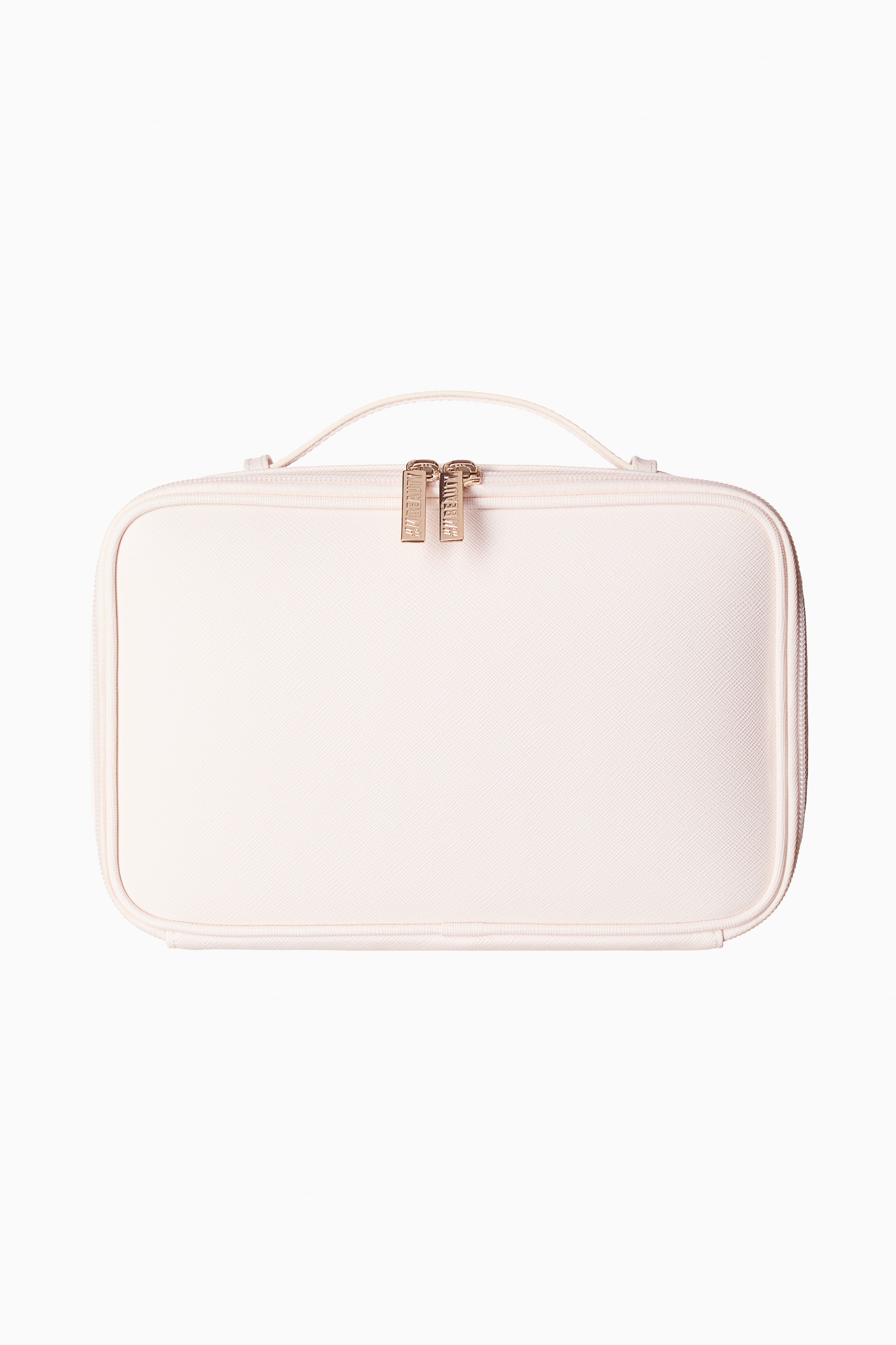 View larger image: A rectangular pale pink wash bag is facing front, featuring a subtle saffiano texture, a two-way zip fastening with two rose-gold zip pulls and a narrow top handle.