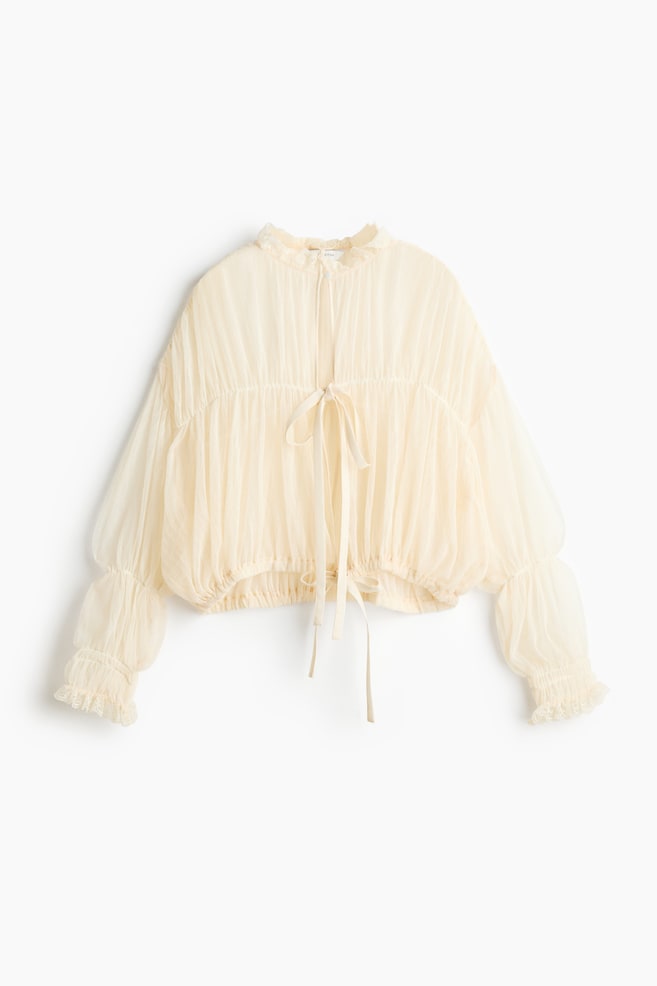 Blusa transparente con lazadas - Crema - 1