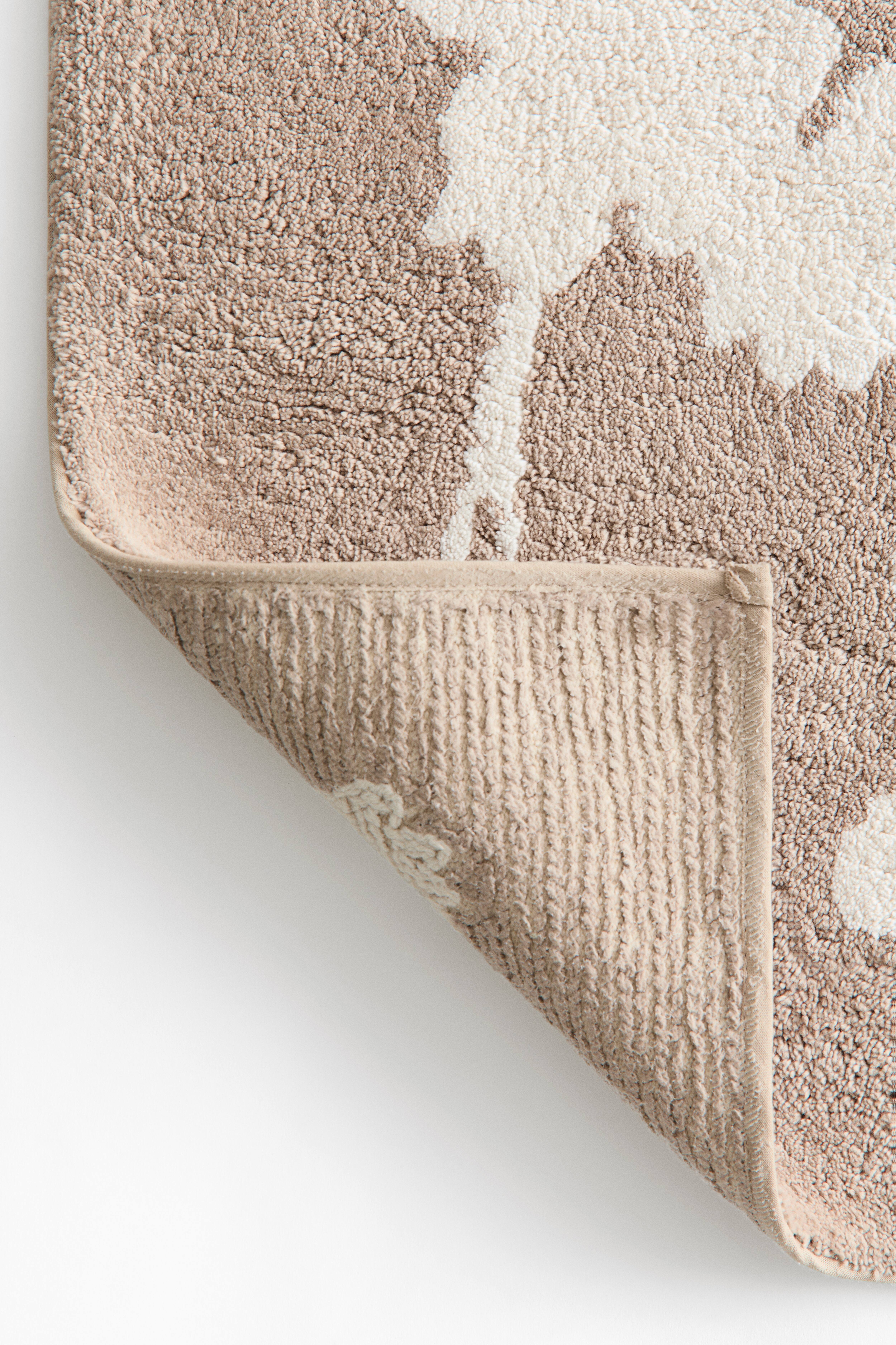 Tapis de bain en coton touffeté