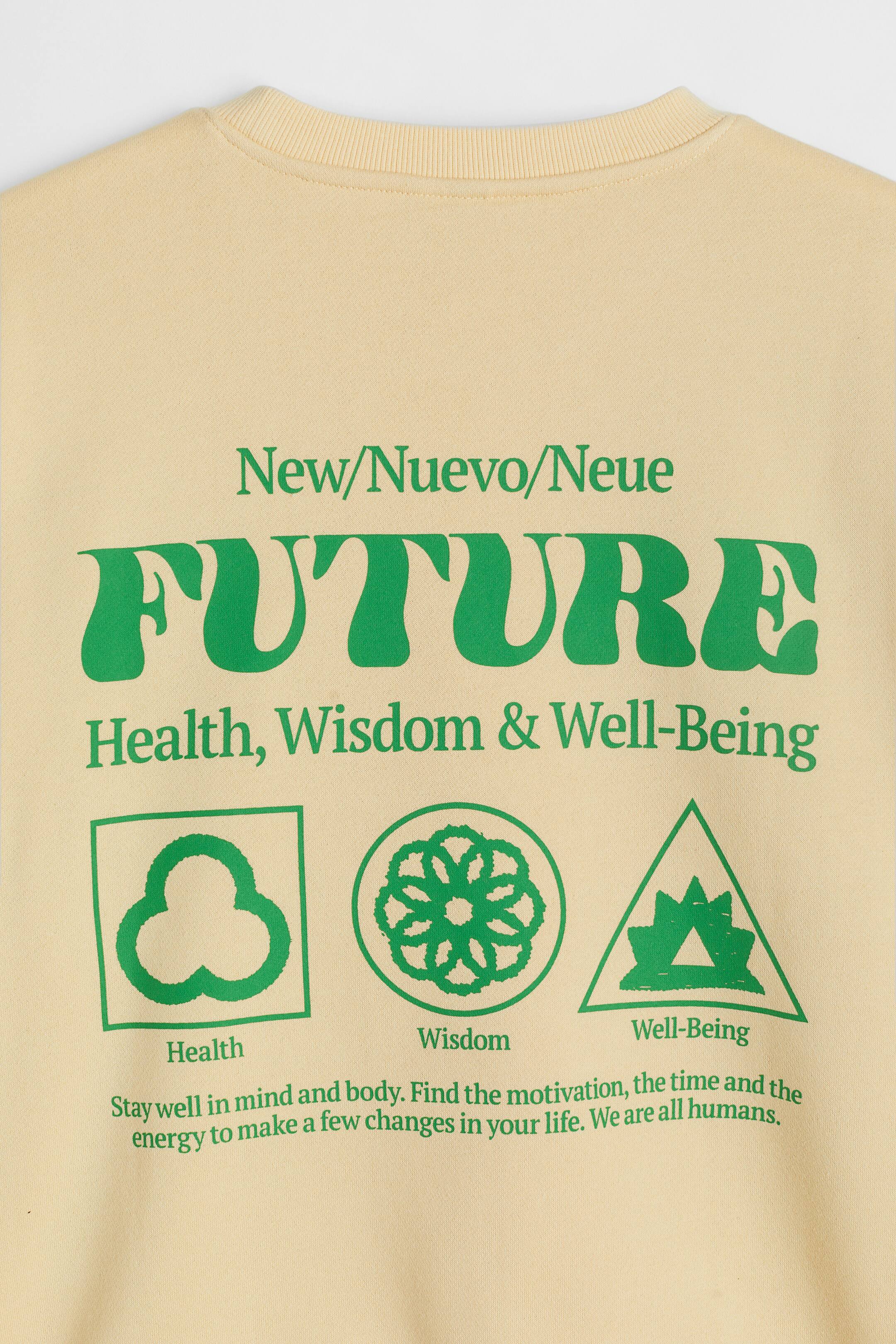 הצגת תמונה גדולה יותר: סווטשירט עם הדפס Loose Fit - צהוב בהיר/New Future - Men | H&M IL 2