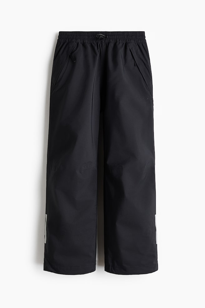 Regular Fit Rain trousers with StormMove™ - Black - 1