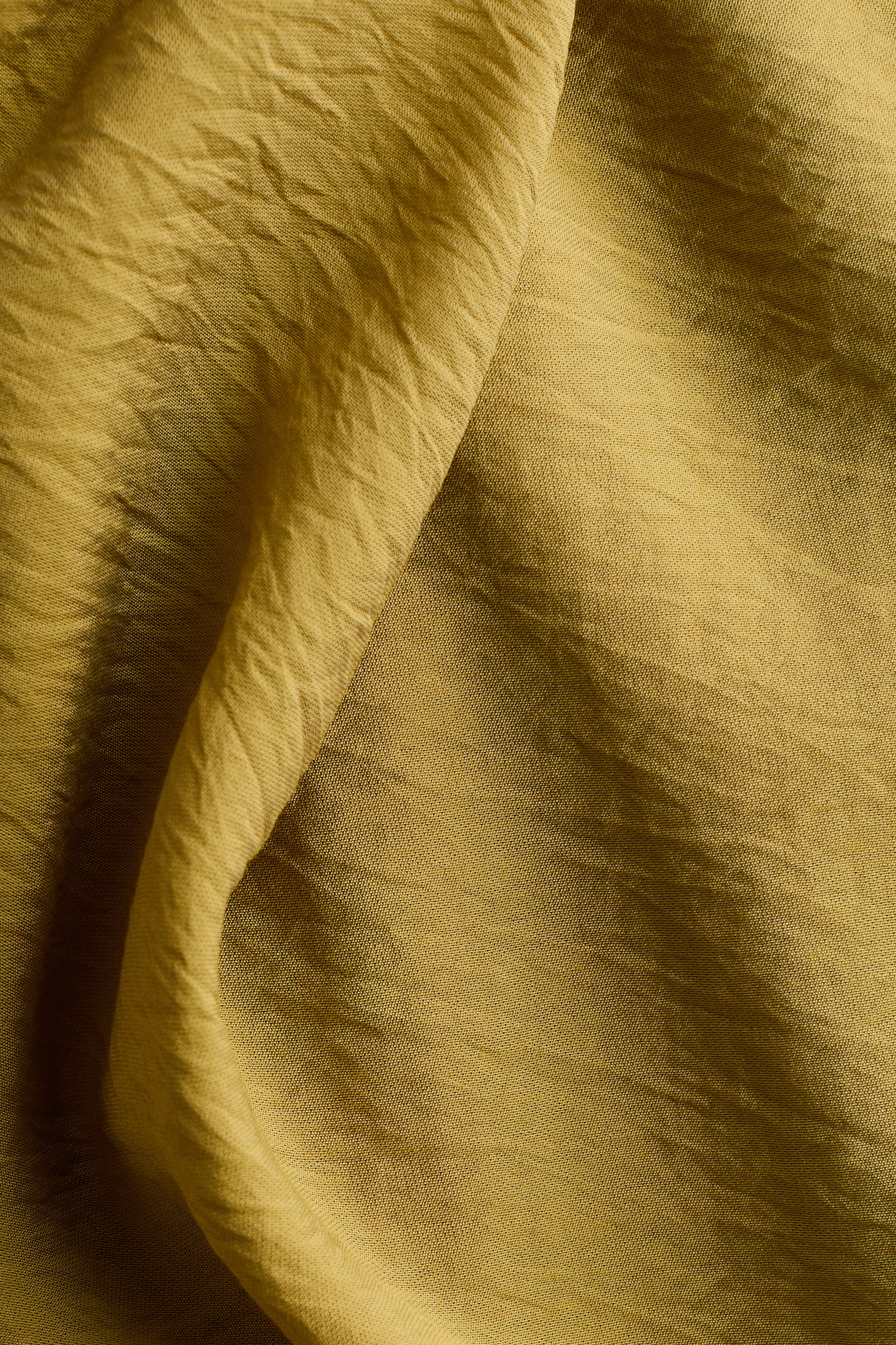 Robe à dos nu et jupe évasée