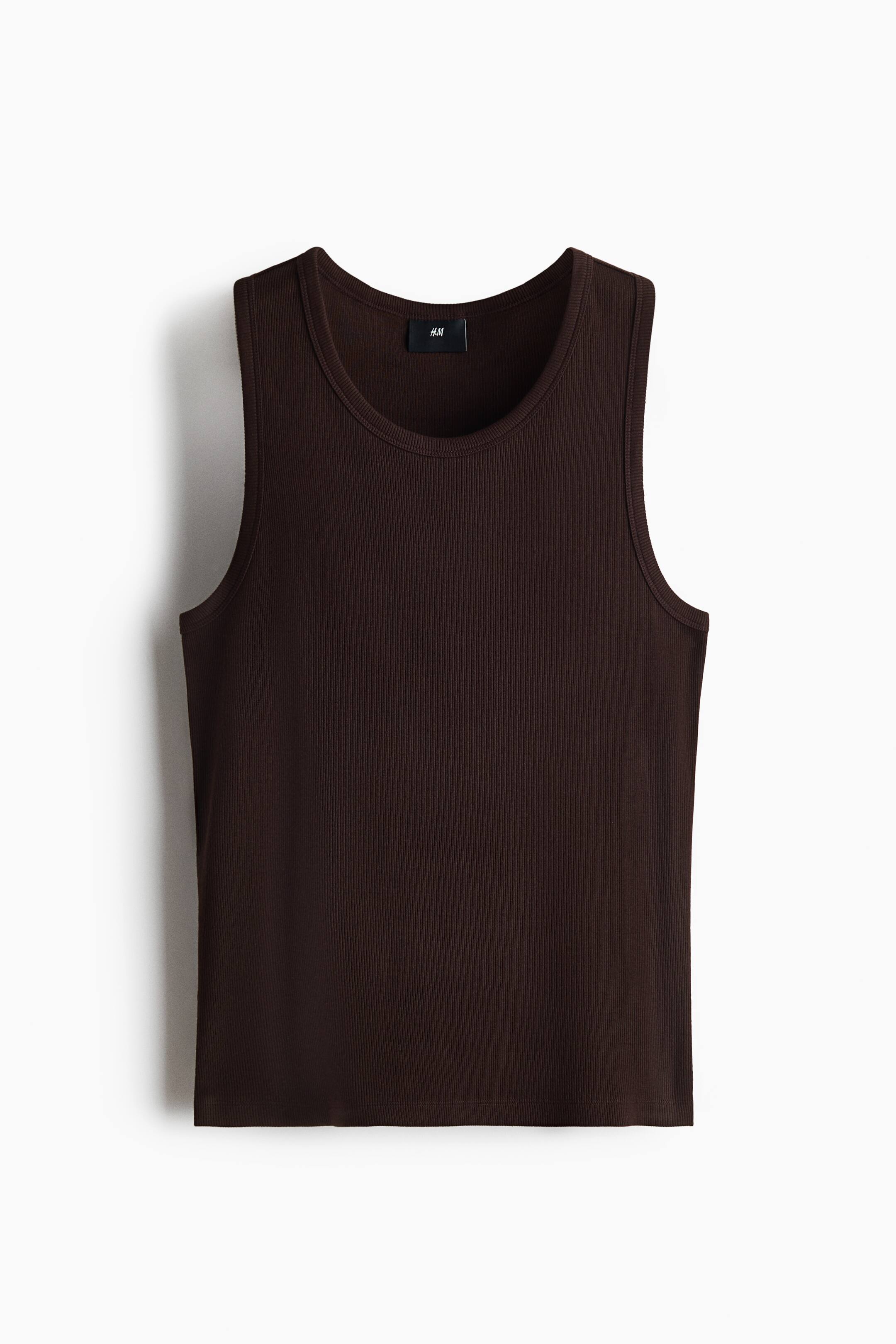 View larger image: A dark brown ribbed tank top features a round neckline, sleeveless armholes, and a straight hem, with an H&M brand tag visible at the inner back neck.