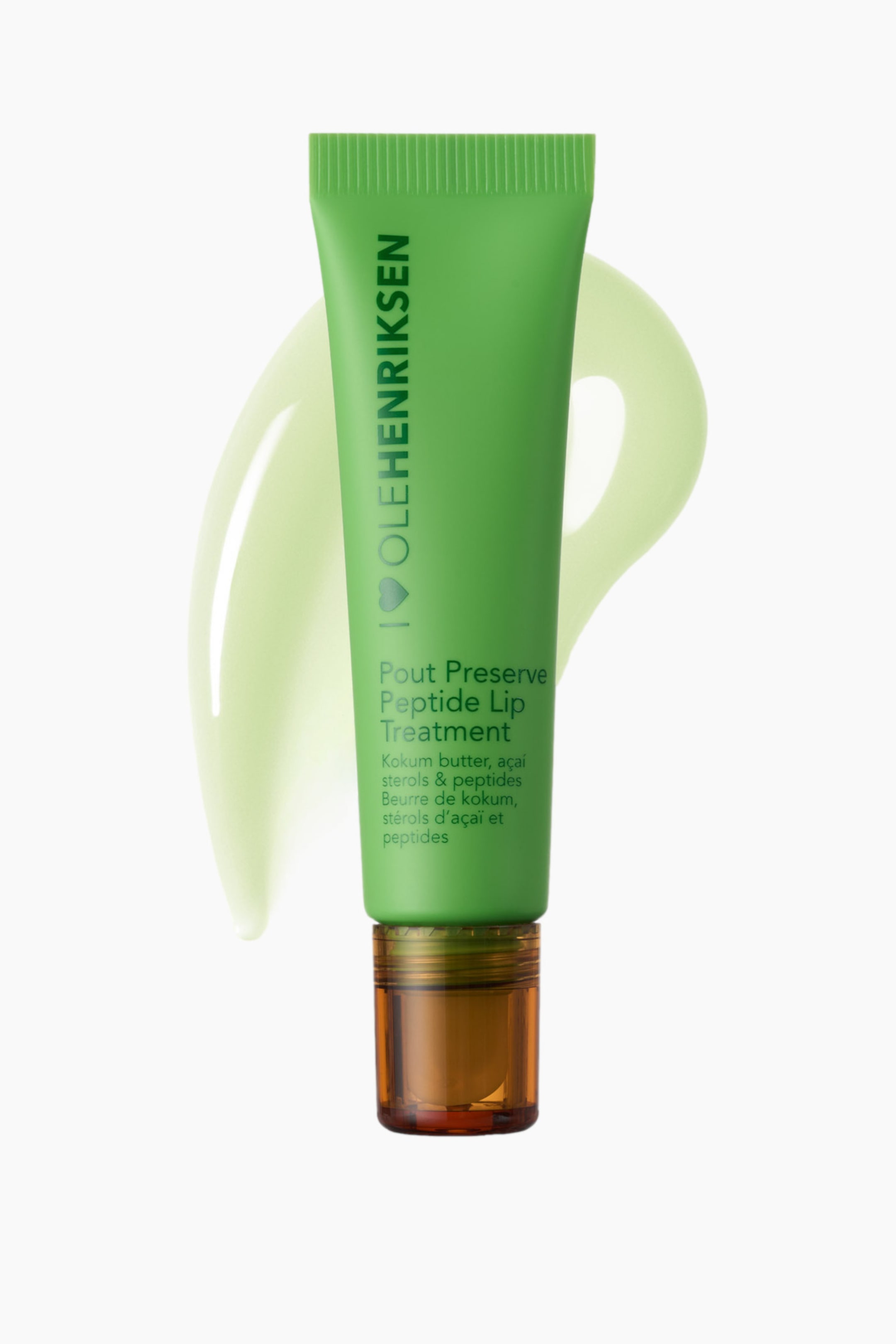Visa större bild: Ett grönt kosmetikrör, stående upprätt och framåtvänd, visar "OLEHENRIKSEN" vertikalt på sin vänstra sida och "Pout Preserve Peptide Lip Treatment" med ingrediensdetaljer på framsidan. En genomskinlig brun kork är synlig vid basen, och en ljusgrön, trögflytande svängning virvlar bakom röret.