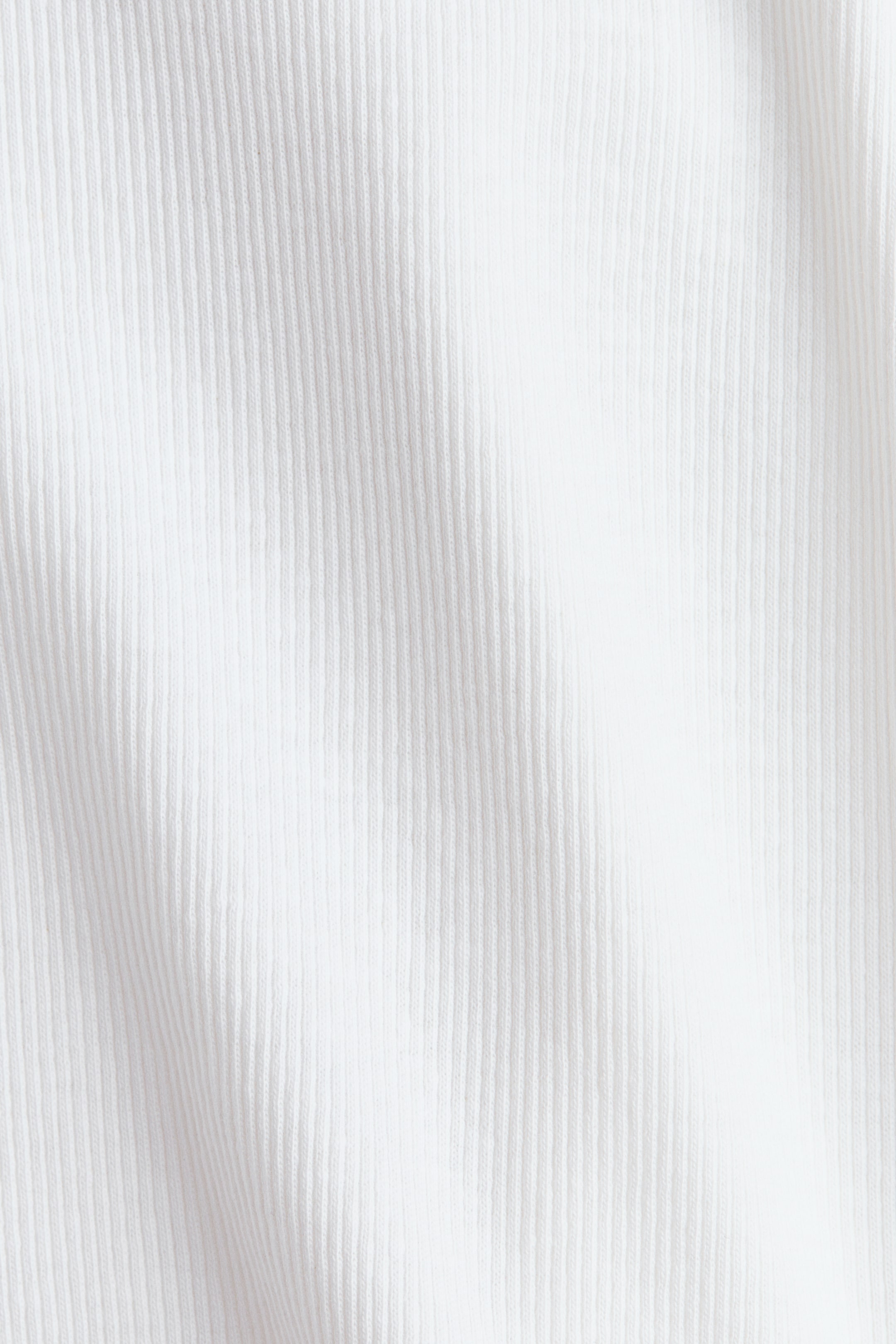 Haut en tricot de coton côtelé