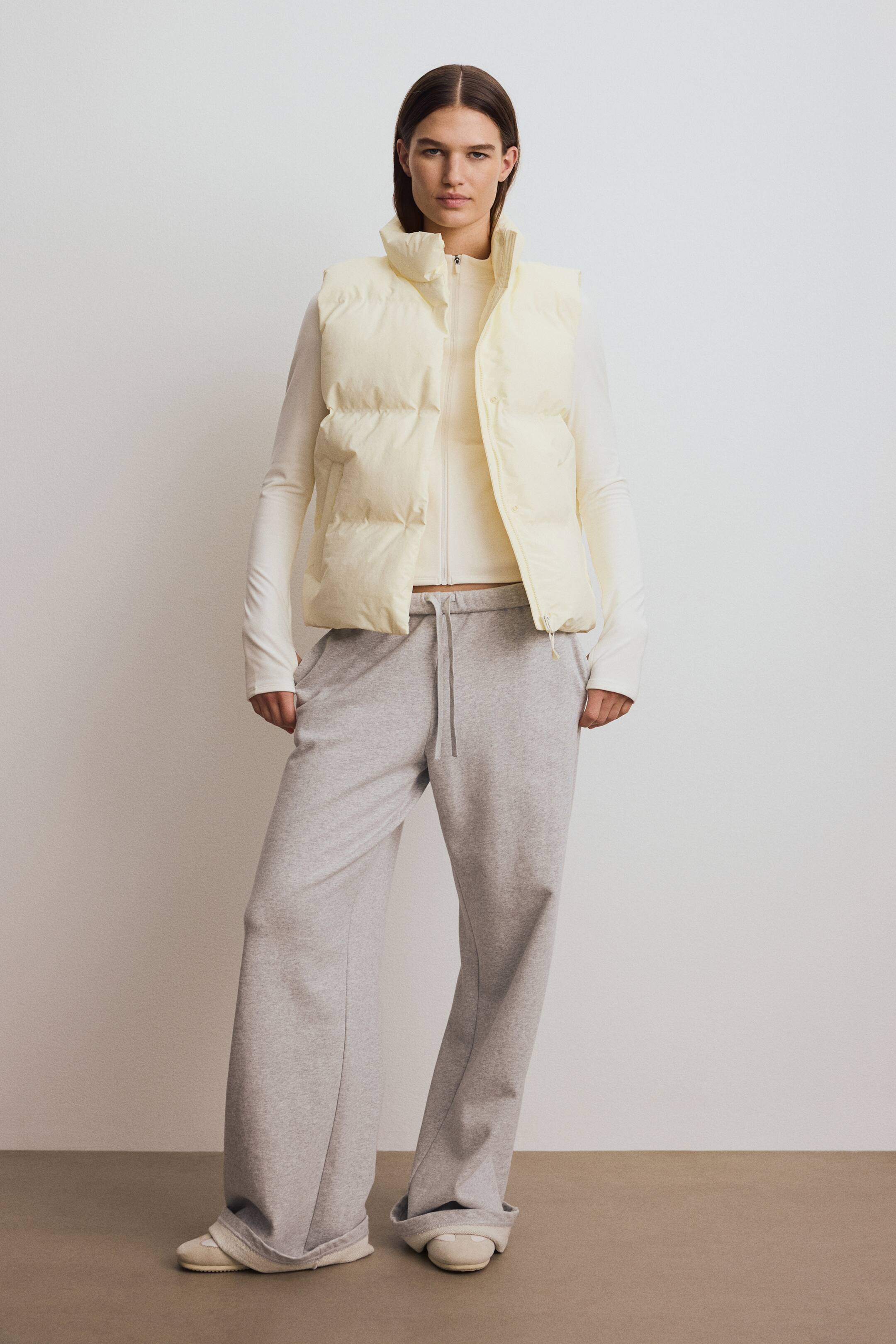 Visa större bild: Vadderad träningsväst med ThermoMove™ - Ljusgul - DAM | H&M FI 3