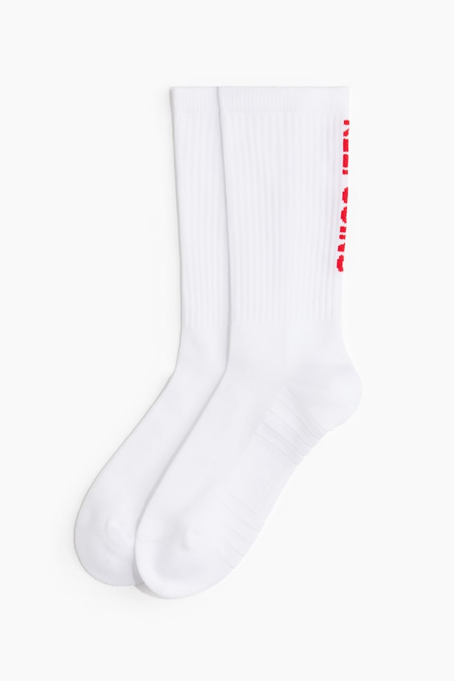 2-pack Calcetines deportivos con DryMove™ - Blanco/Keep Going - 1