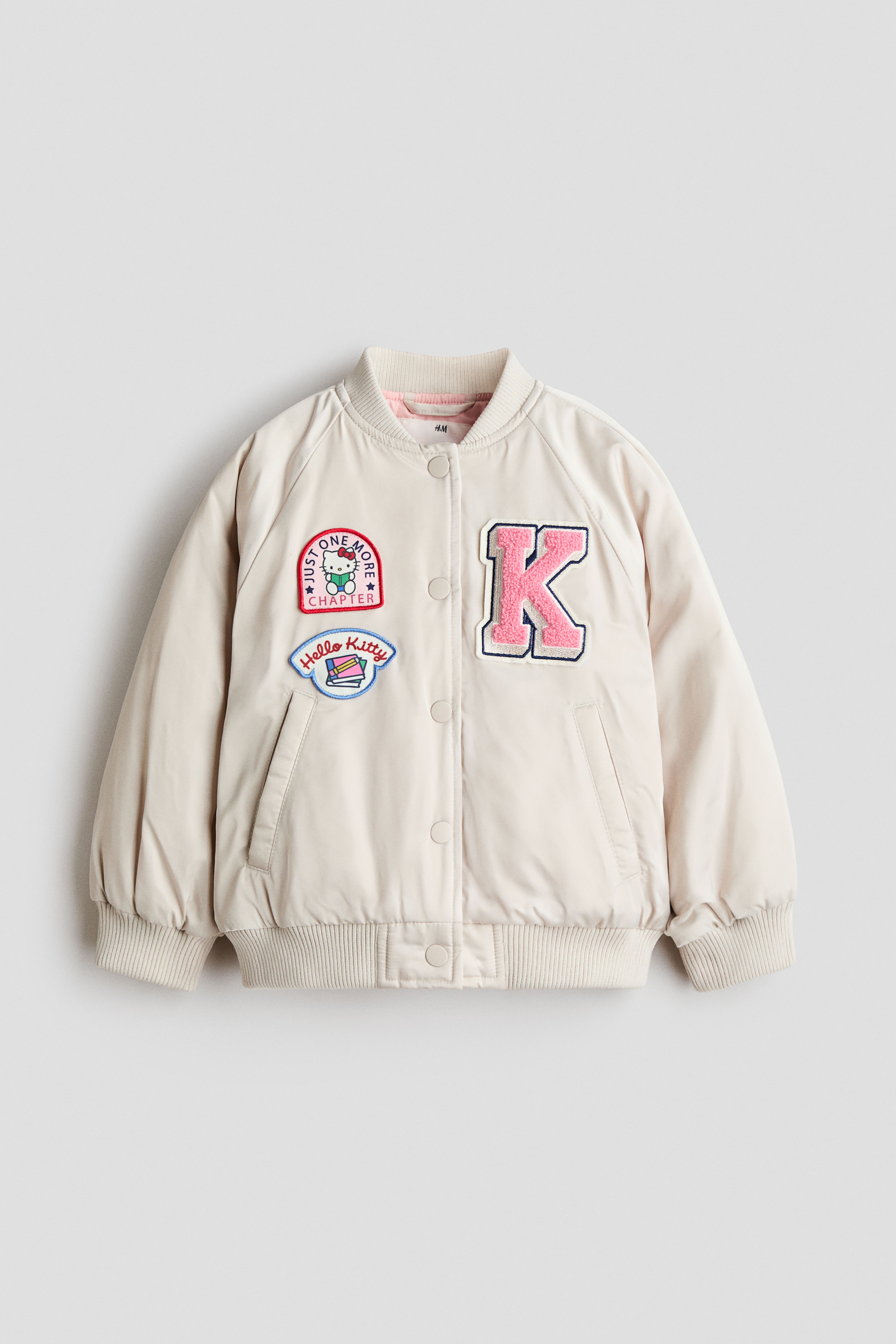 Blouson de baseball avec écussons matelassés