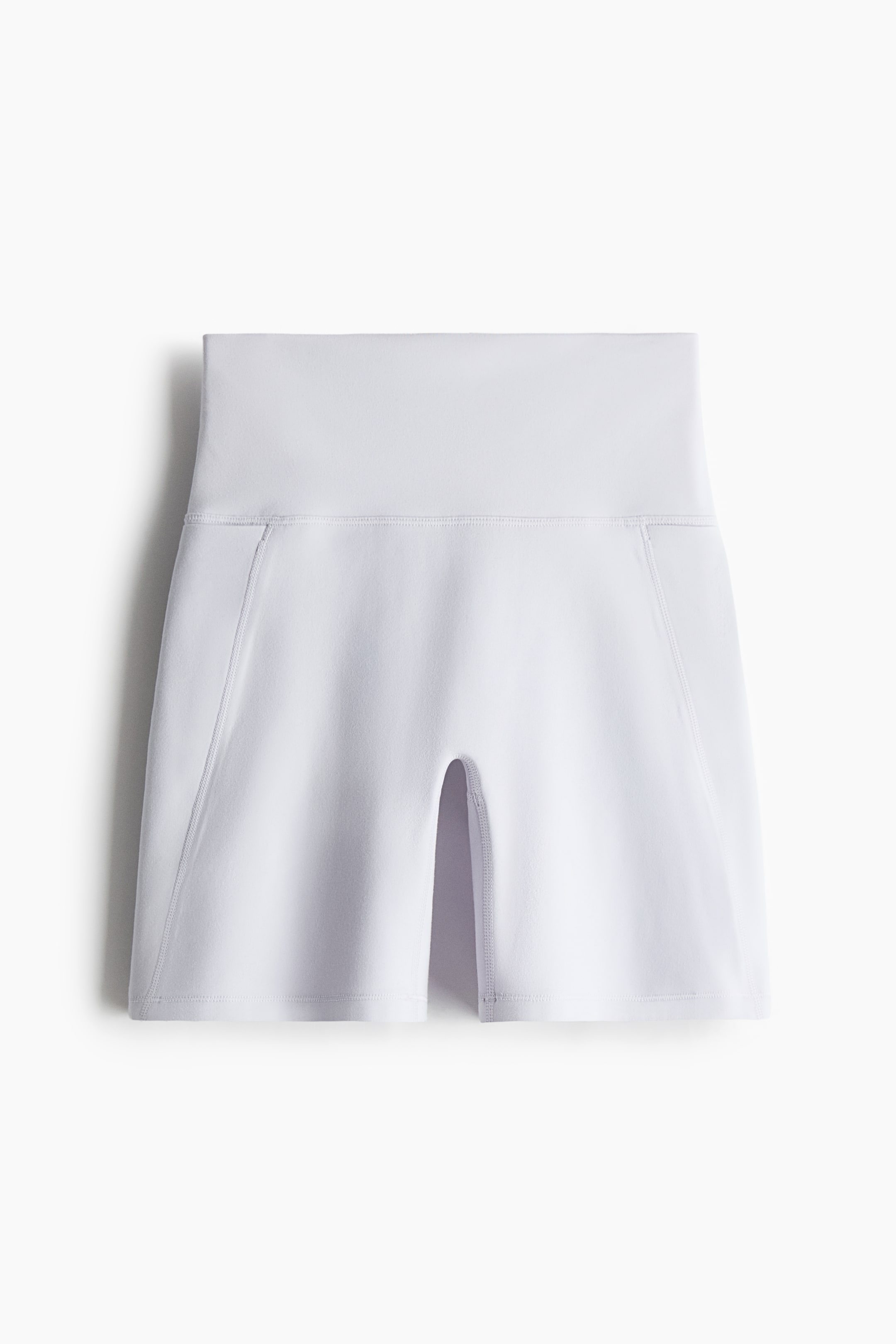 View larger image: The white athletic shorts are shown from the front, featuring a wide, high-waisted band. Visible side seams run down the legs, which end in a short inseam.
