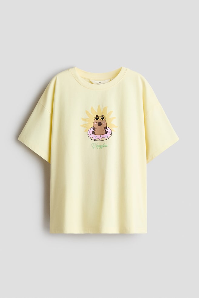 Printed Cotton T-Shirt - Light yellow/CapyFun/Ivory/SmileyWorld®/Pink/Lilo & Stitch/Dark gray/Lilo & Stitch/Light gray melange/Kuromi/Light dusty blue/CapyFun/White/KPop Demon Hunters/Light pink/Snoopy/Light dusty blue/Cinnamoroll/White/Pochacco/Black/KPop Demon Hunters - 1