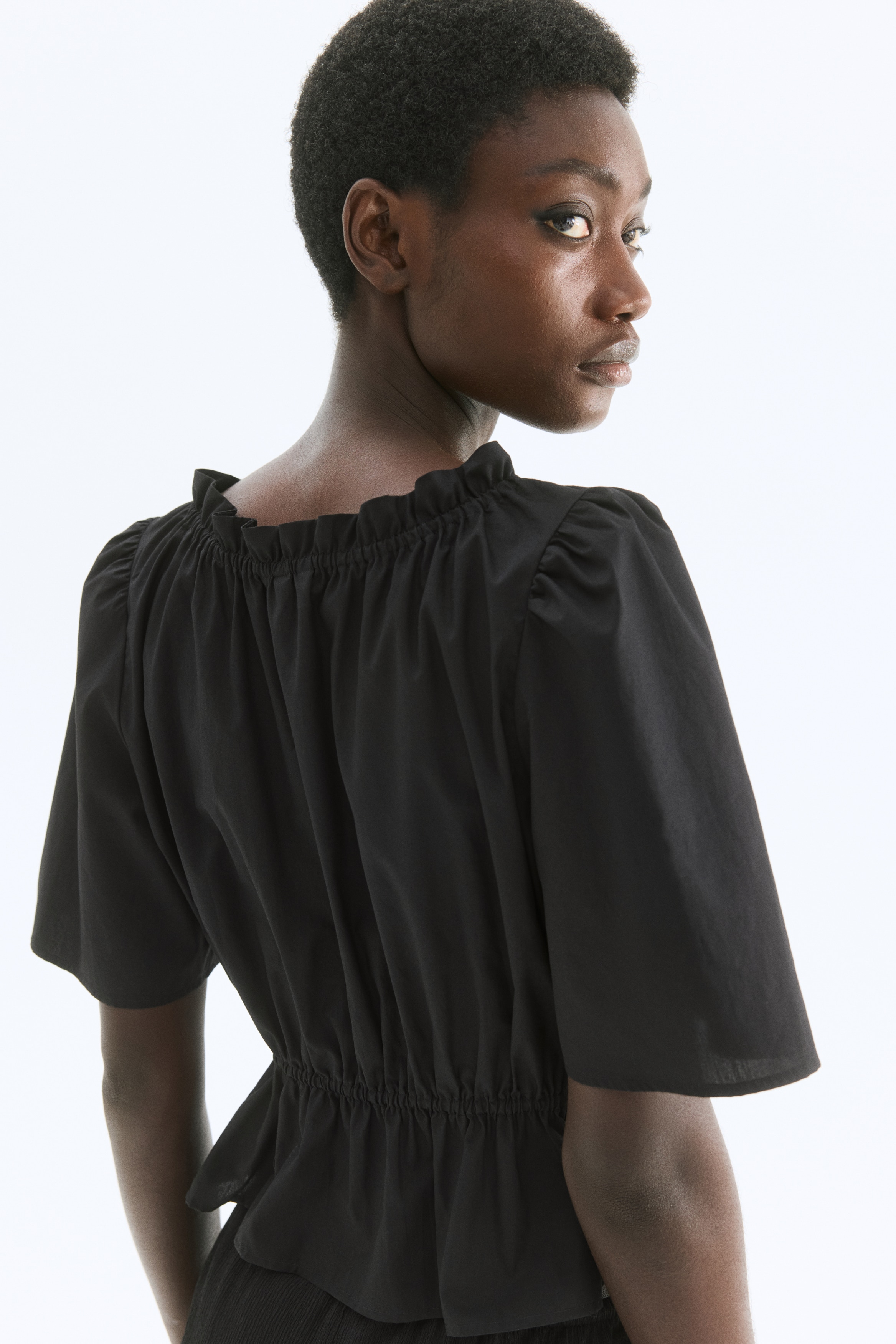 Frill-trimmed cotton blouse
