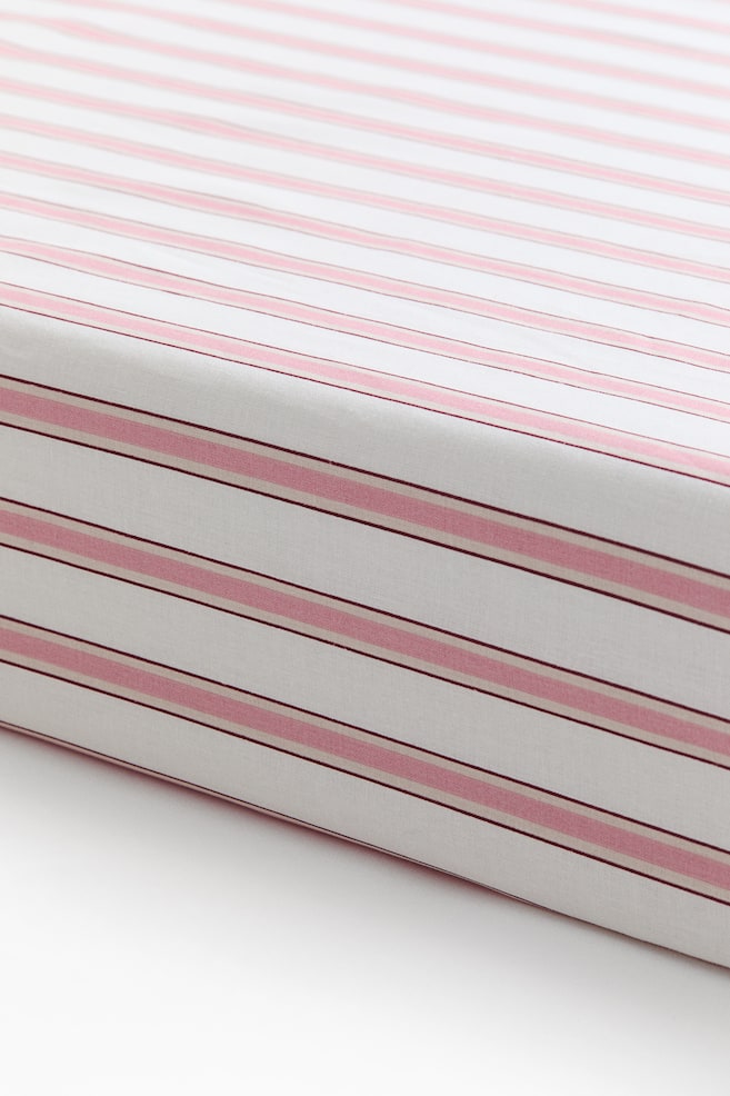Patterned cotton fitted sheet - Light pink/Striped/Dark green/Striped/White/Spotted/Light beige/Unicorns/Light green/Vehicles/Light blue/Planes/Light pink/Patterned/White/Hearts/Light beige/Dinosaurs/Light yellow/Oranges/Dark blue/Space motifs/Light pink/Floral/Green/Dinosaurs/White/Hearts/Light greige/Floral - 1