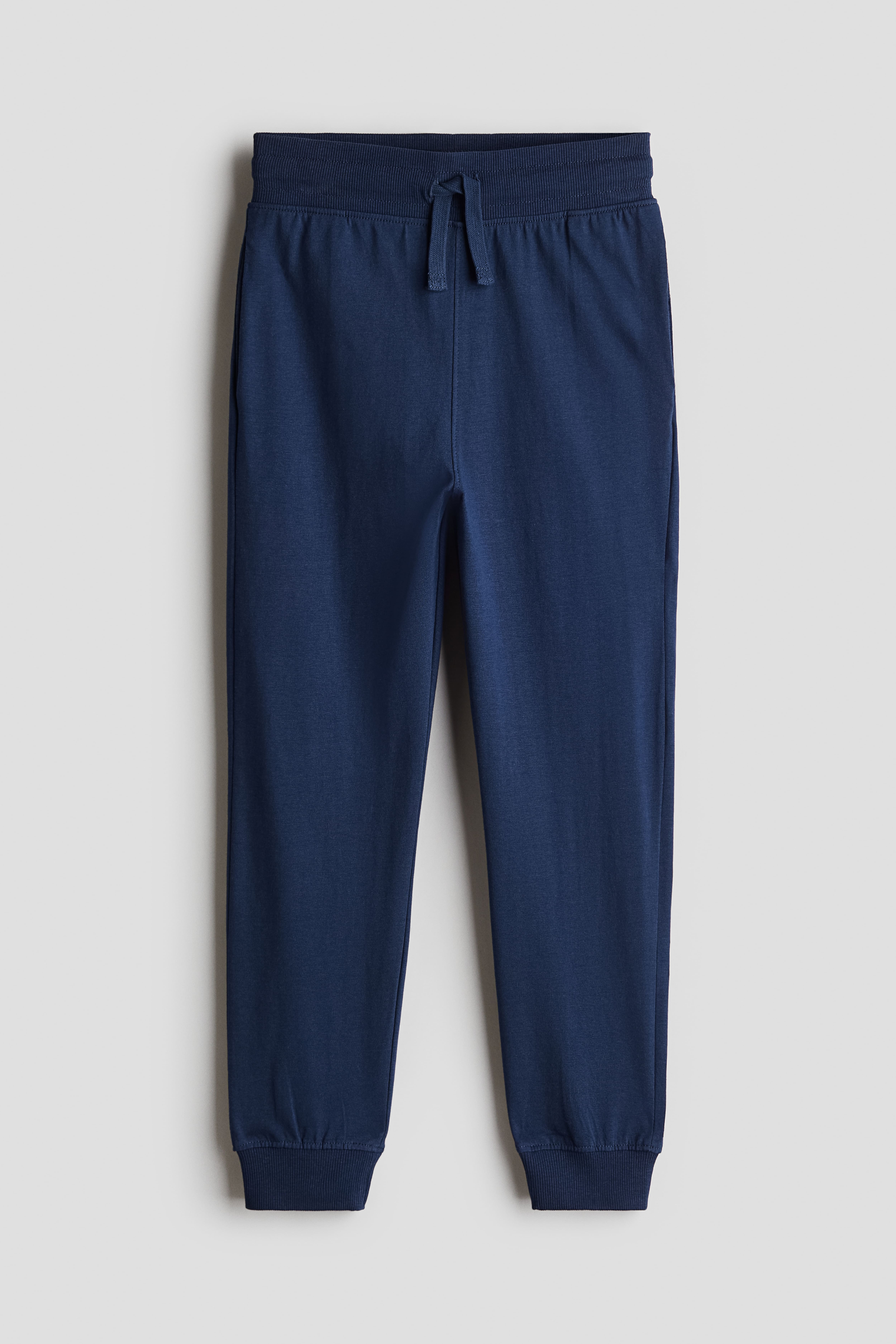 Cotton Jersey Joggers - Regular waist - Long - Navy blue - Kids | H&M US